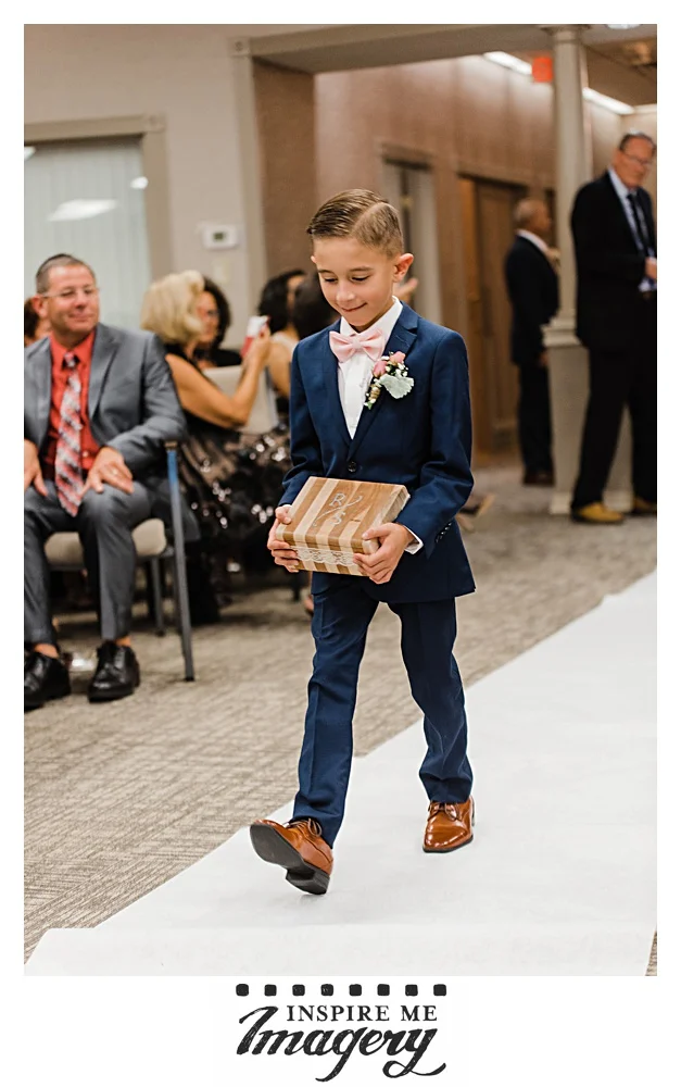 The little man did the job well! Bring a ring bearer is serious business.