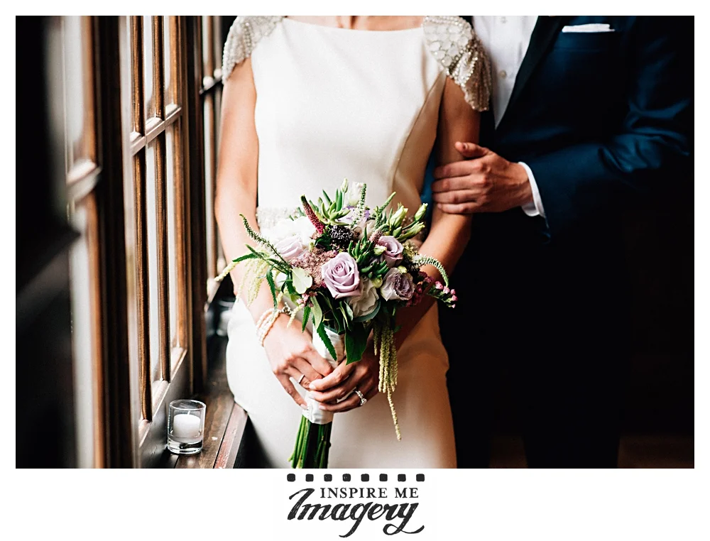 It was a little rainy on their wedding day, but Hotel du Village has plenty of beautiful spots for indoor portraits. The gentle window light showcased her flowers beautifully.