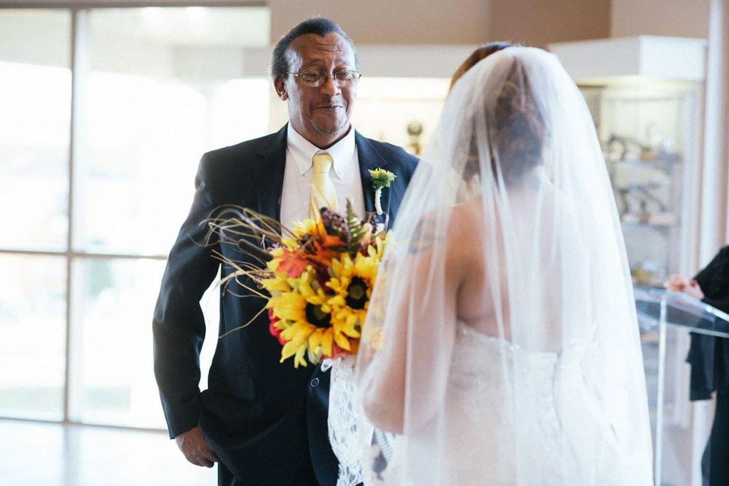 Holly Patterson - My dad seeing me in my dress for the first time before walking me down the isle with my mother
