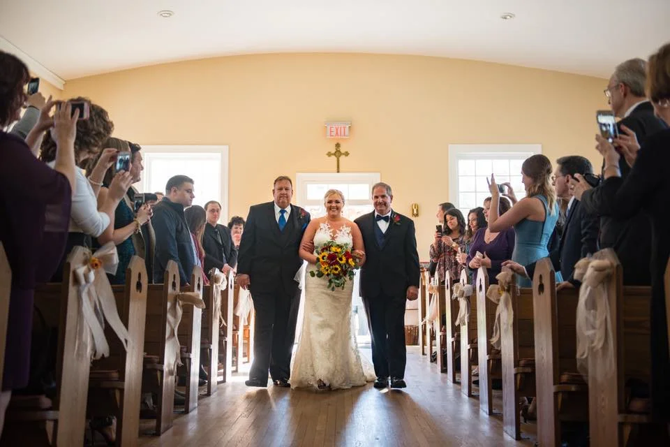 Kim Acerra - Couldn’t choose just one! Loved having both my father and step-father walk me down the aisle. And capture my hubby’s reaction to seeing me for the first time 💕