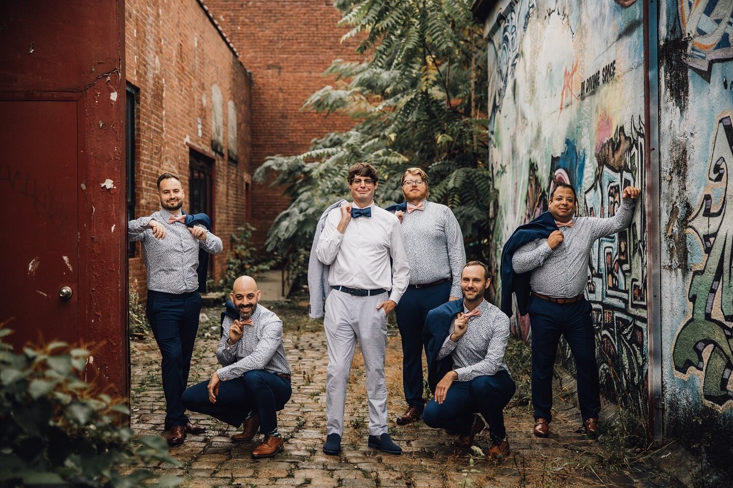 I&rsquo;ve always been a fan of the clean cut suit against a rough backdrop. The contrast between the two makes for some interesting photos. @artfactorypaterson #uniquevenue #artisticphotography #njweddingphotography #groomsmen #groomsuit