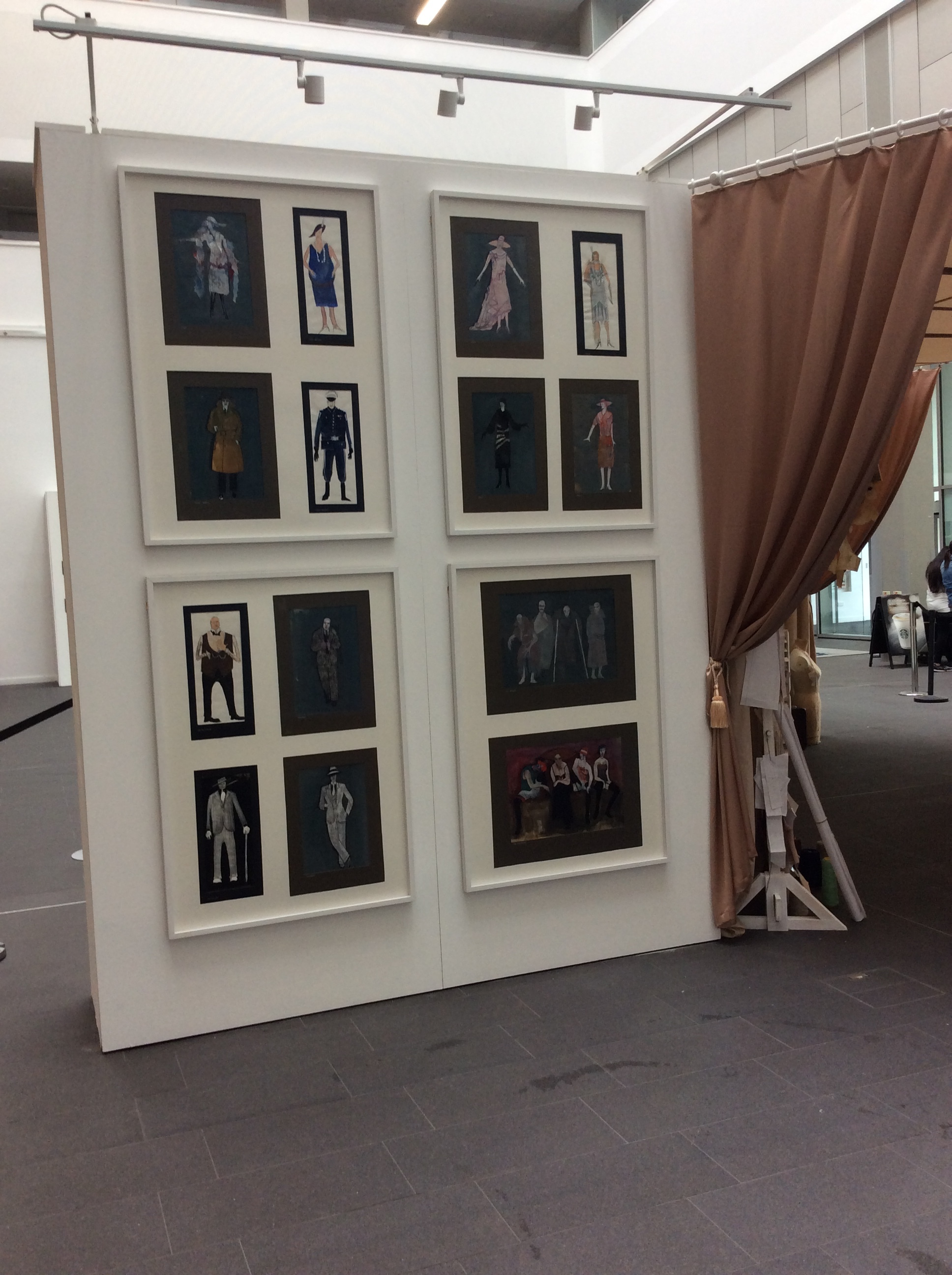 Installation shot of Cabinets of Costume exhibition showing theatrical costume designs for The Threepenny Opera by students in the early 1970s from BCU's Art & Design Archives, Parkside Gallery, May 2017.