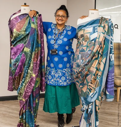 Poulomi Desai with her saris at STEAM European Researchers Night at Heritage Quay, University of Huddersfield, 2017. Photo credit: Maddie Farris.