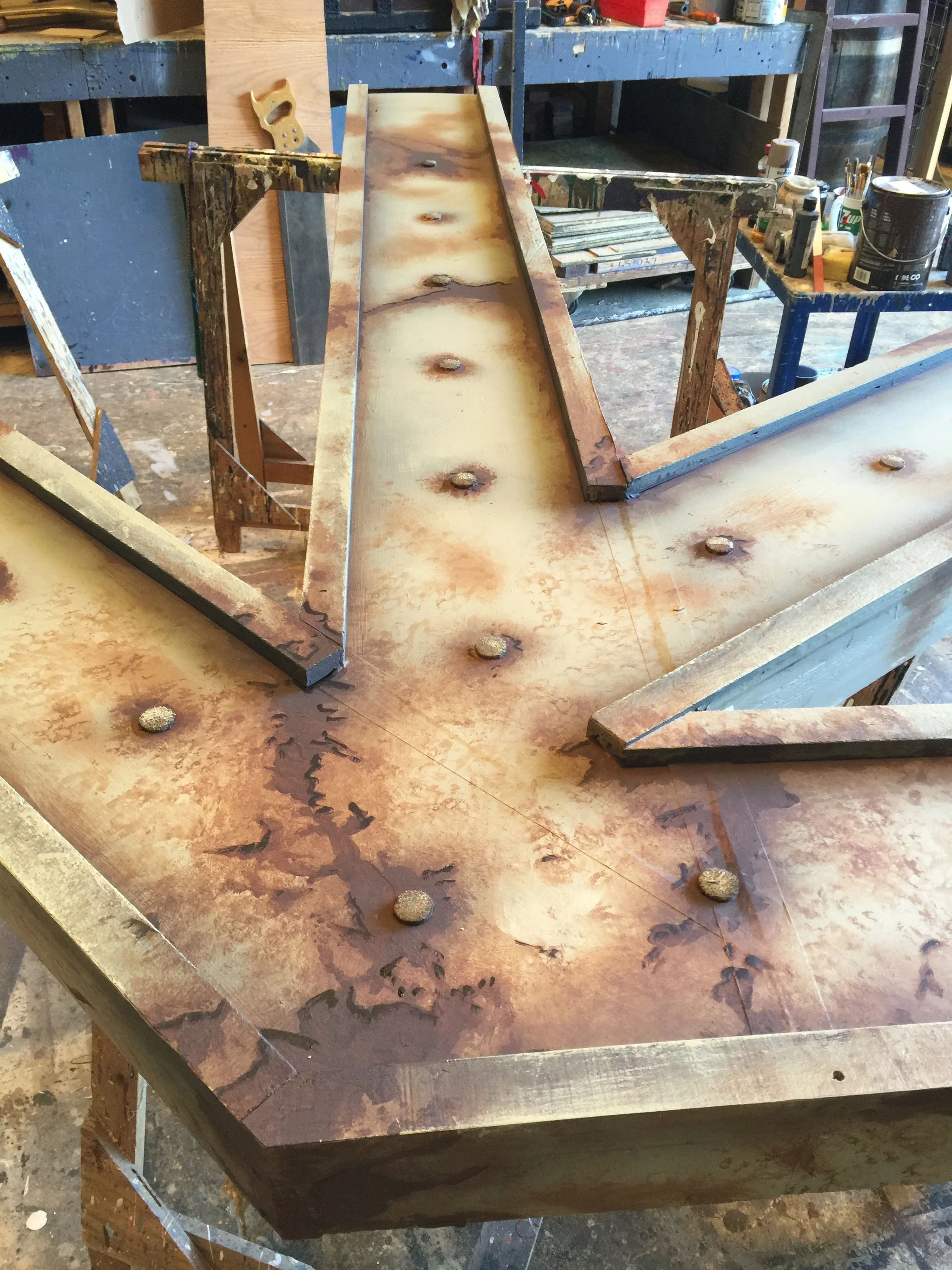 Beam for Urinetown set