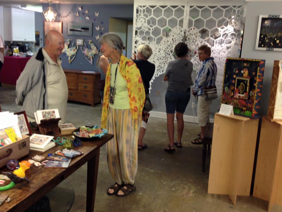 Photo by Karin bolstad . the amazing paper cut hanging is by blueschool artist melissa koch . some of my assemblages can be seen on the far right.