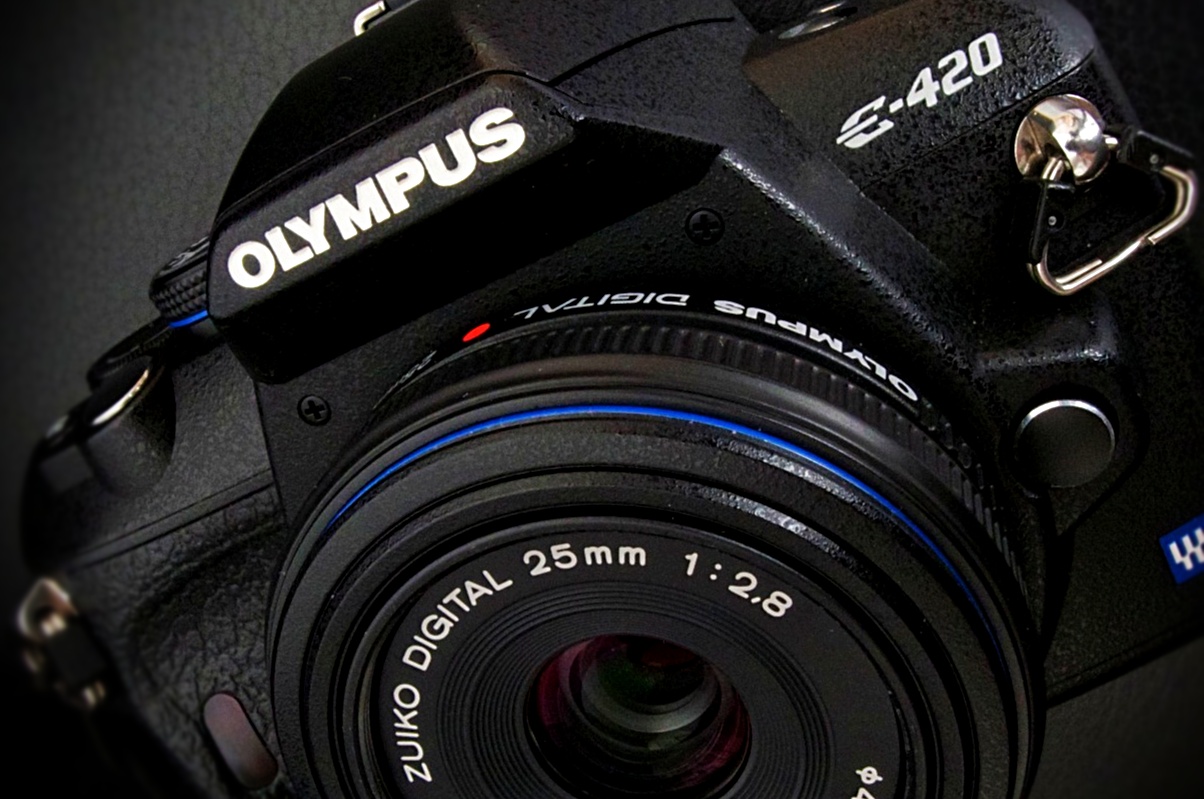 Announced in March 2008 and advertised as the 'World's Smallest and Lightest' DSLR, the 10MP Four-Thirds System E-420 came with a new Zuiko 25mm f2.8 Pancake lens, which made it a very compact and handy casual travel unit. G21506175