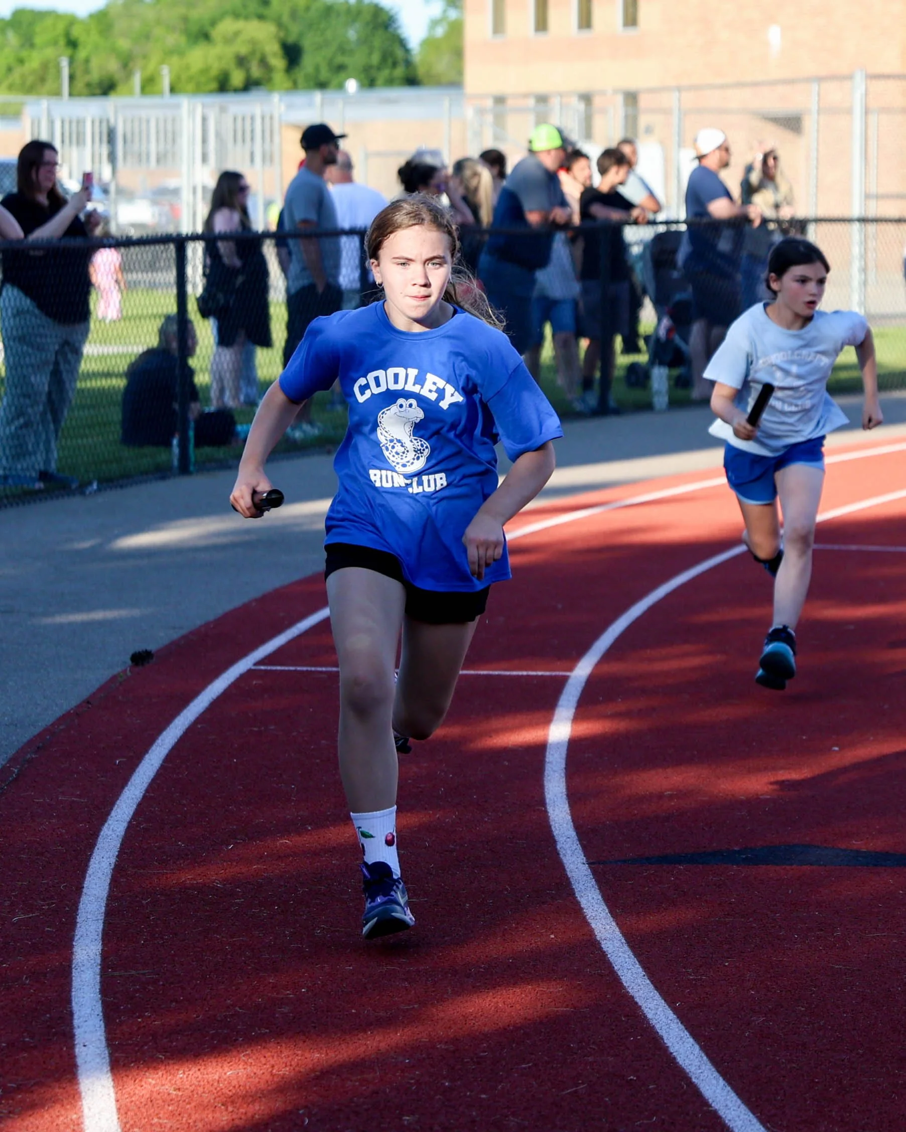 Cooley runner starts the 4x400 relay