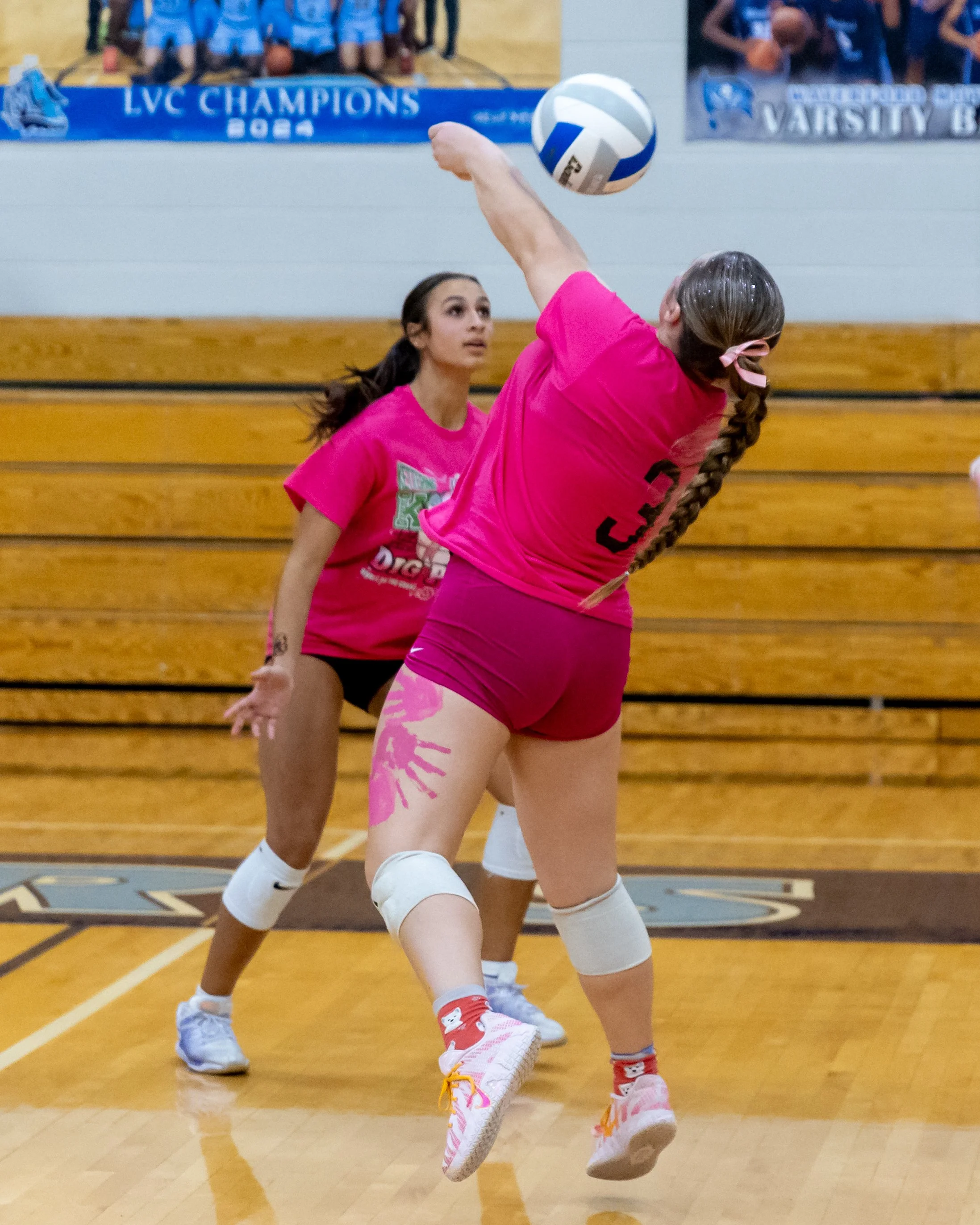 Kettering player hits the ball