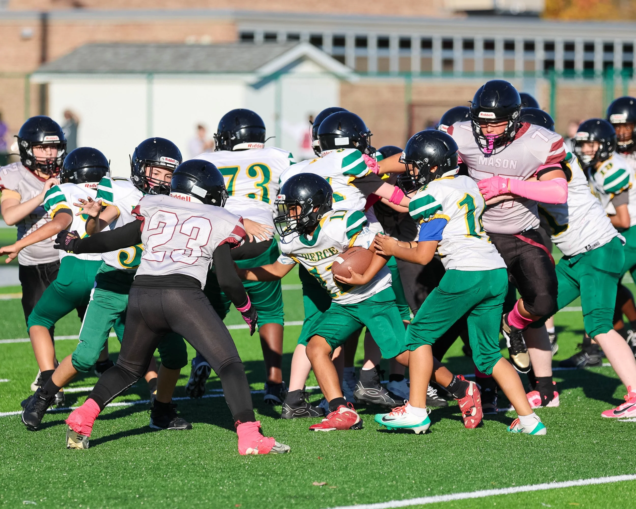 Pierce #11 carries the ball