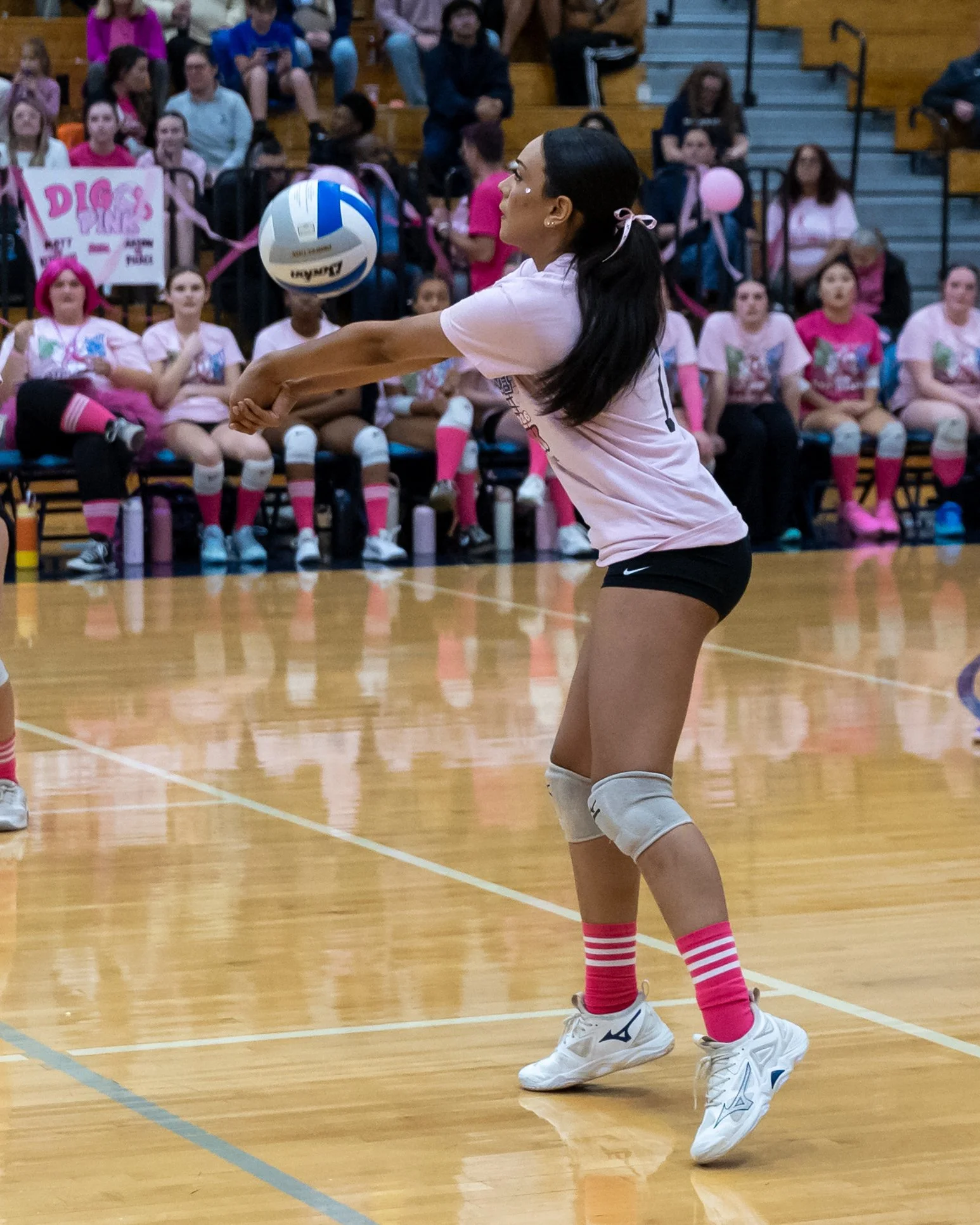 Mott player hits the ball