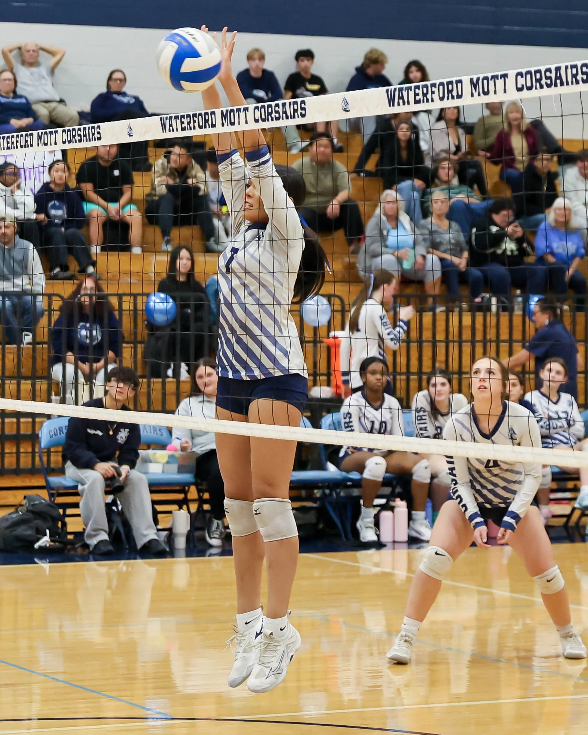Mott #7 up to block the ball