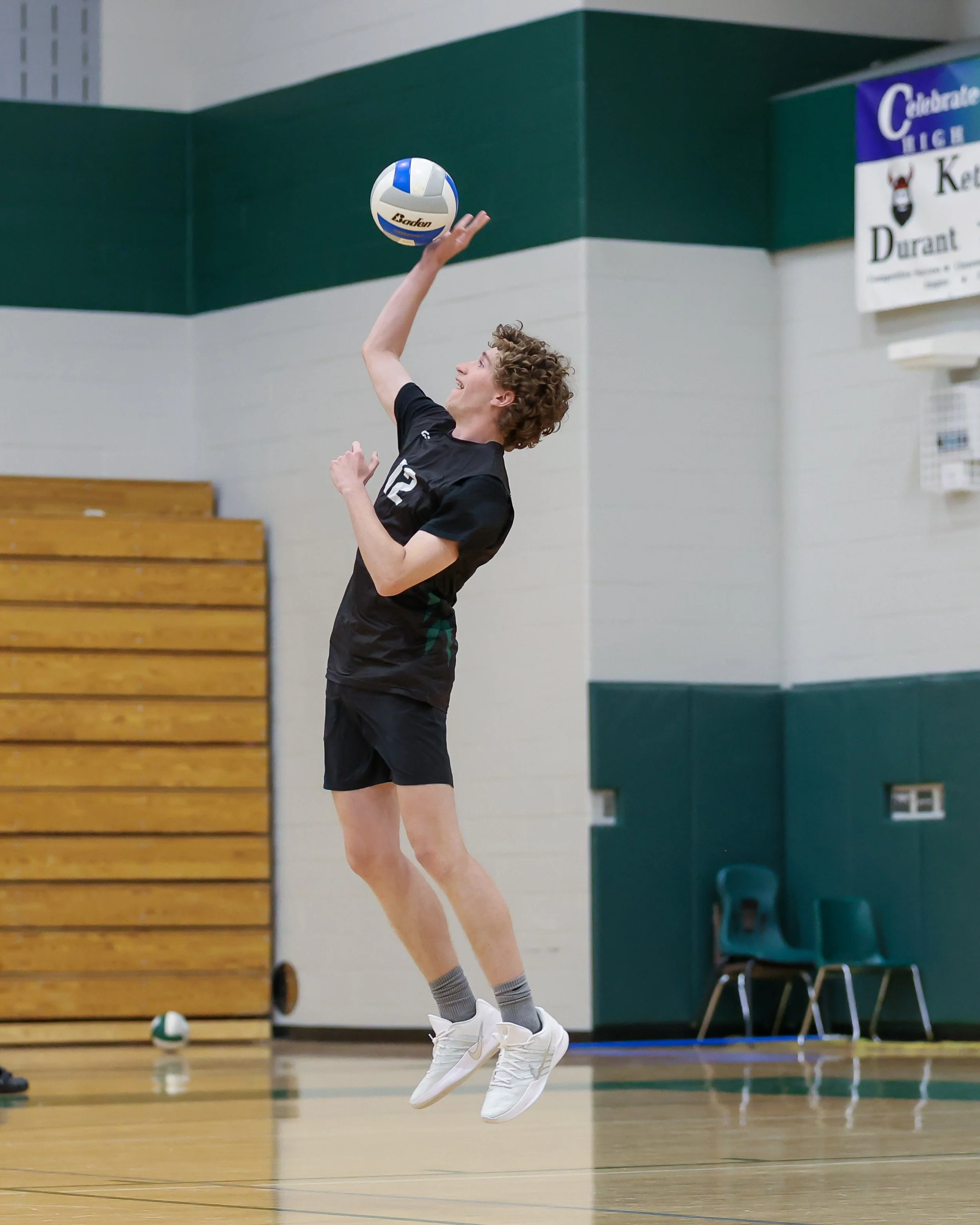 #12 returns the ball