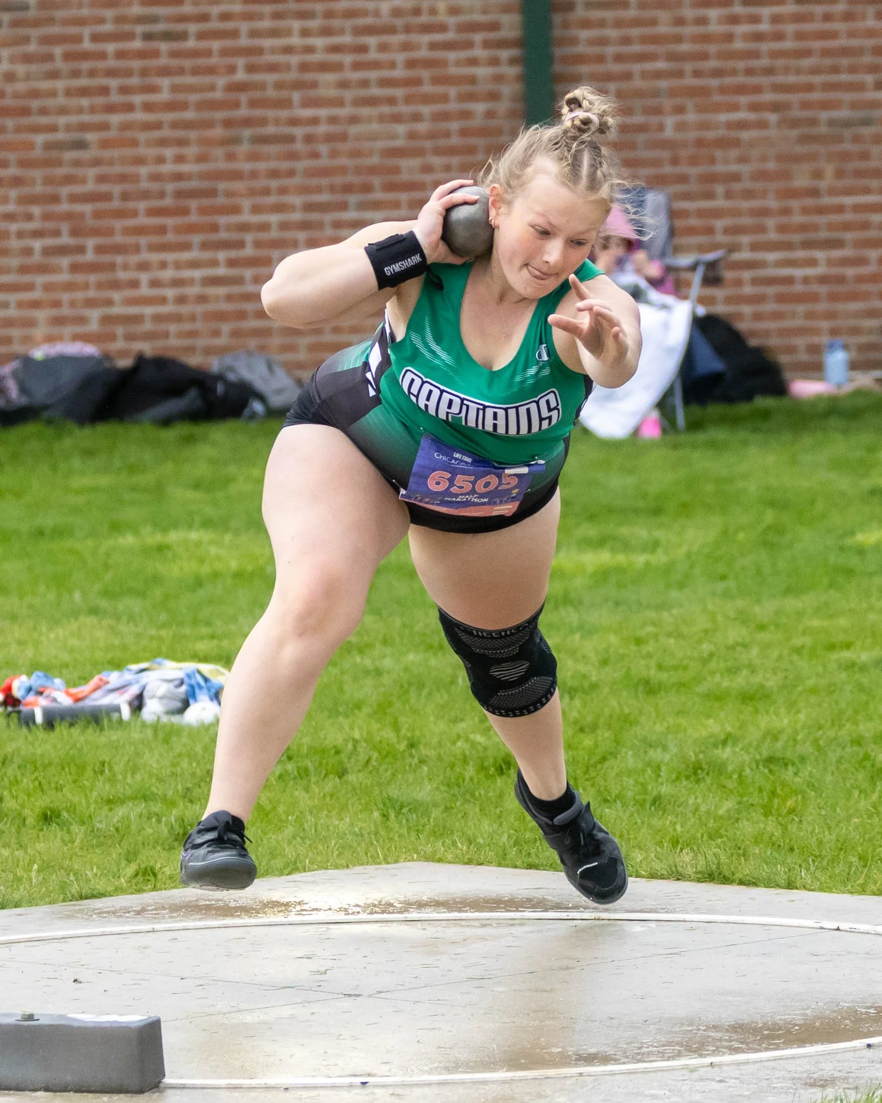 Kettering #6505 starts the shot put