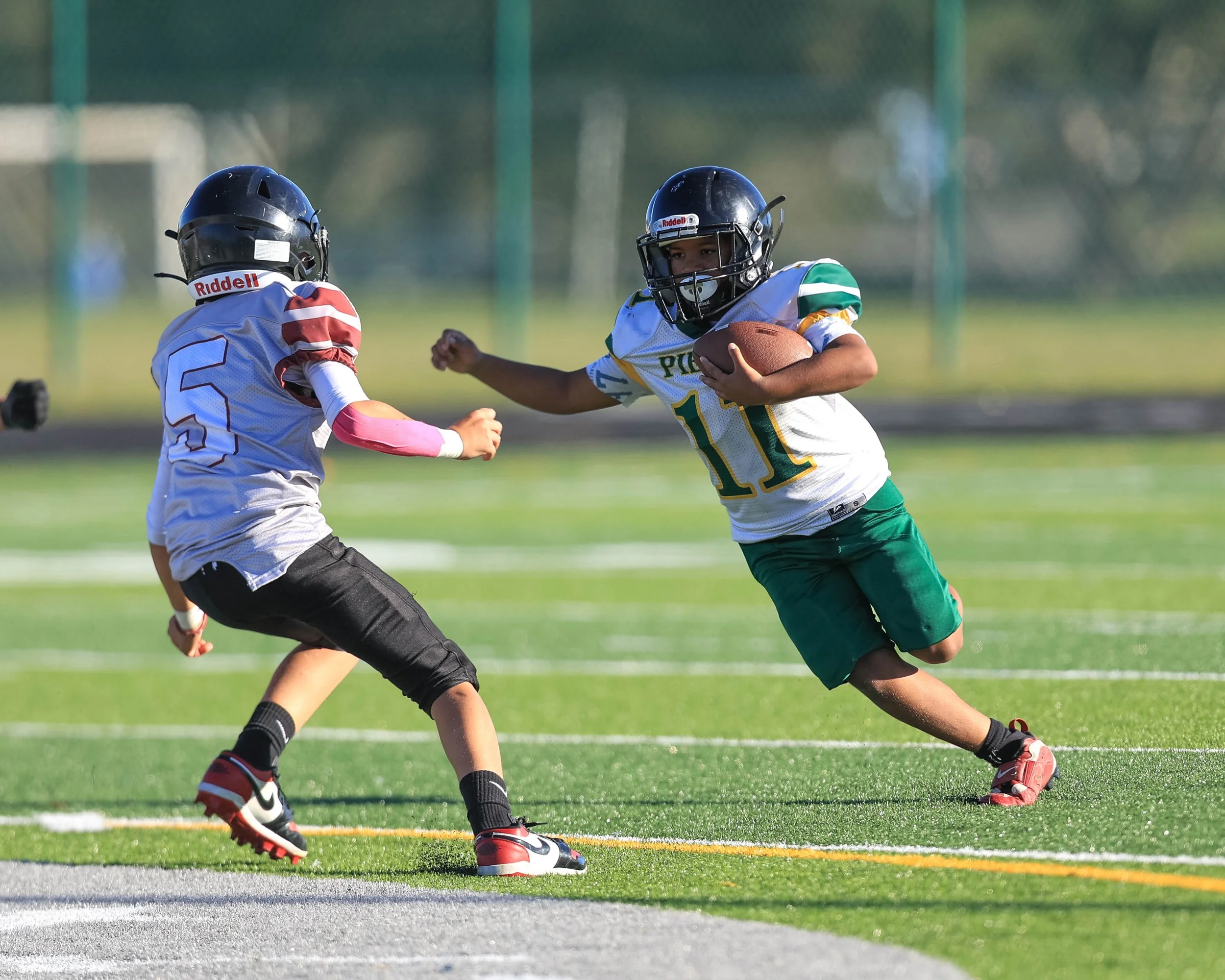 Pierce #11 carries the ball