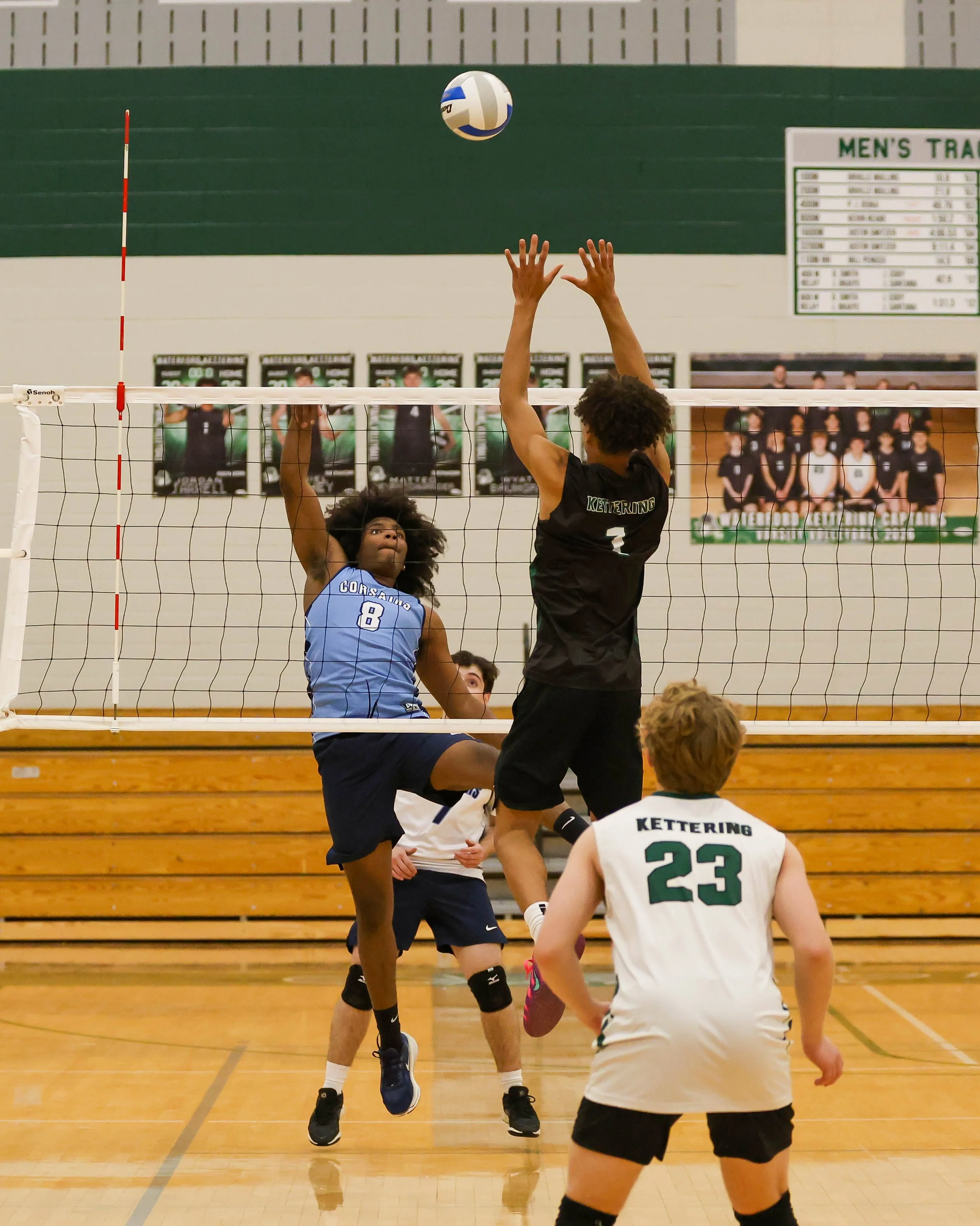 Mott #8 hits the and Kettering #1 goes for the block