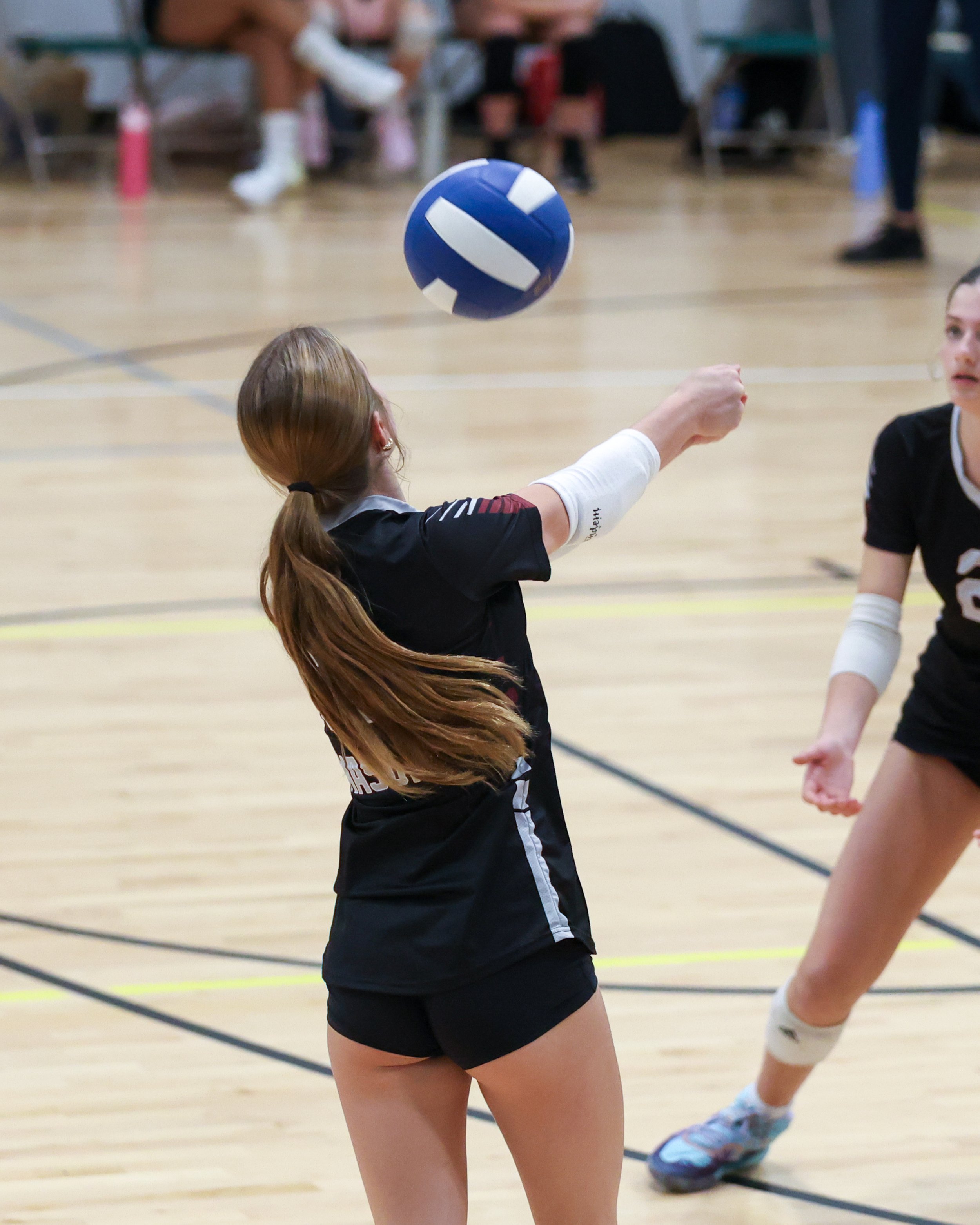 Mason girl returns the ball