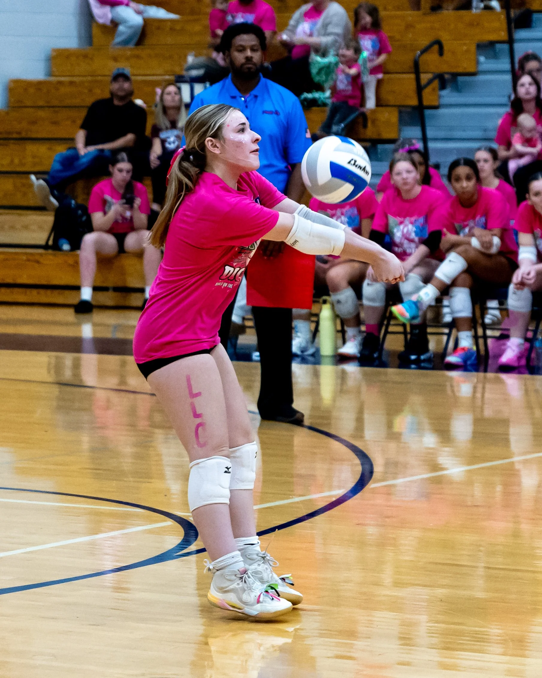 Kettering player hits the ball