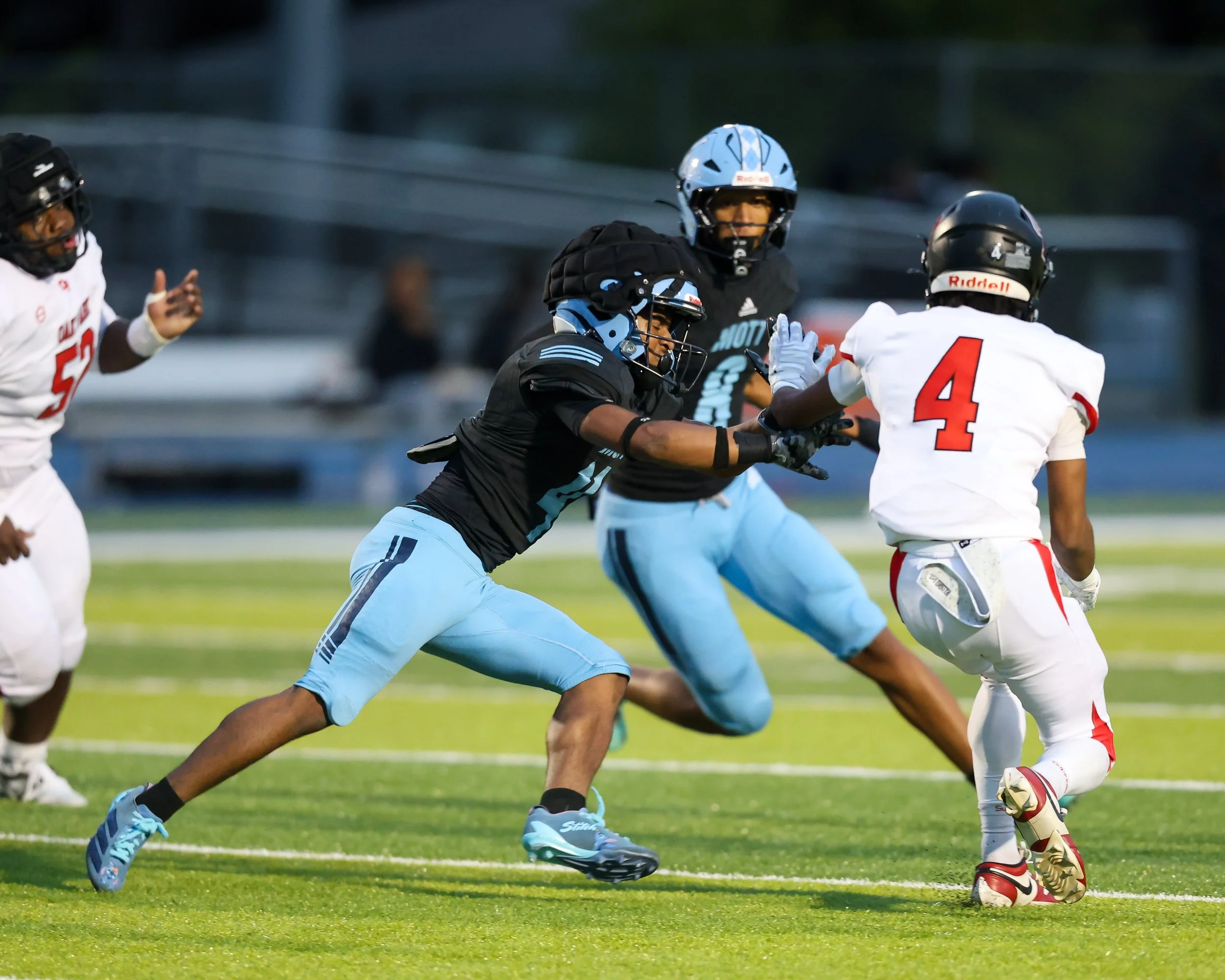 WK #8 carries the ball