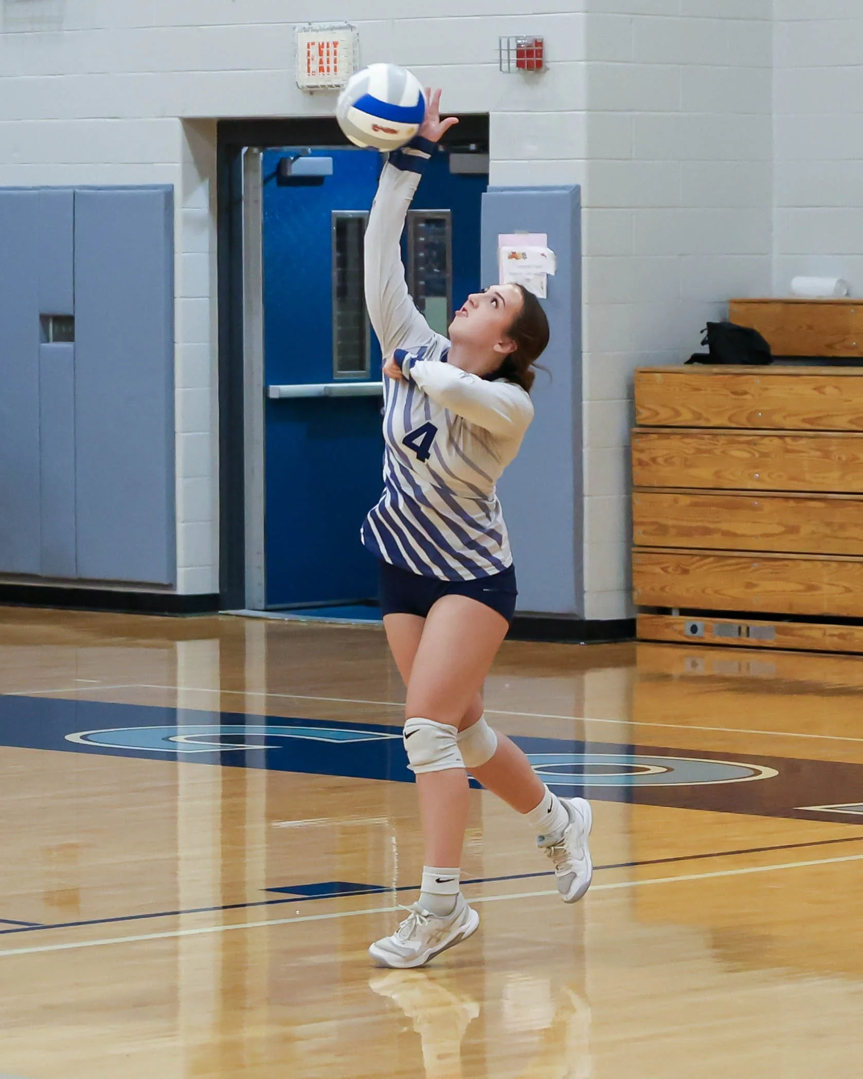 Mott #26 serves the ball