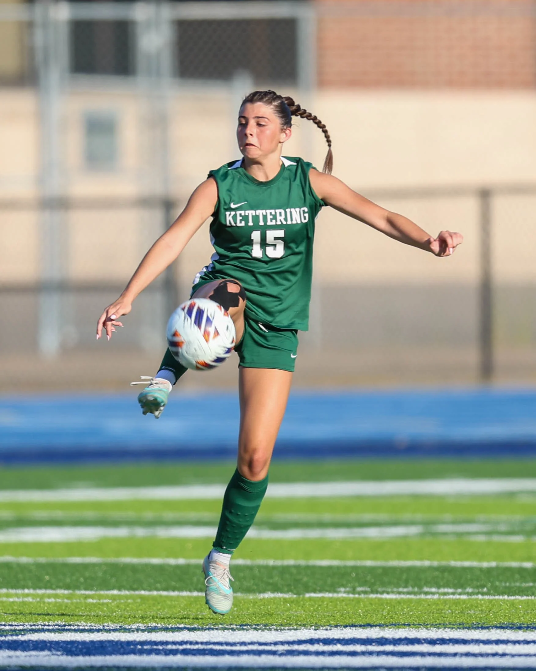 #15 controls the ball in the air