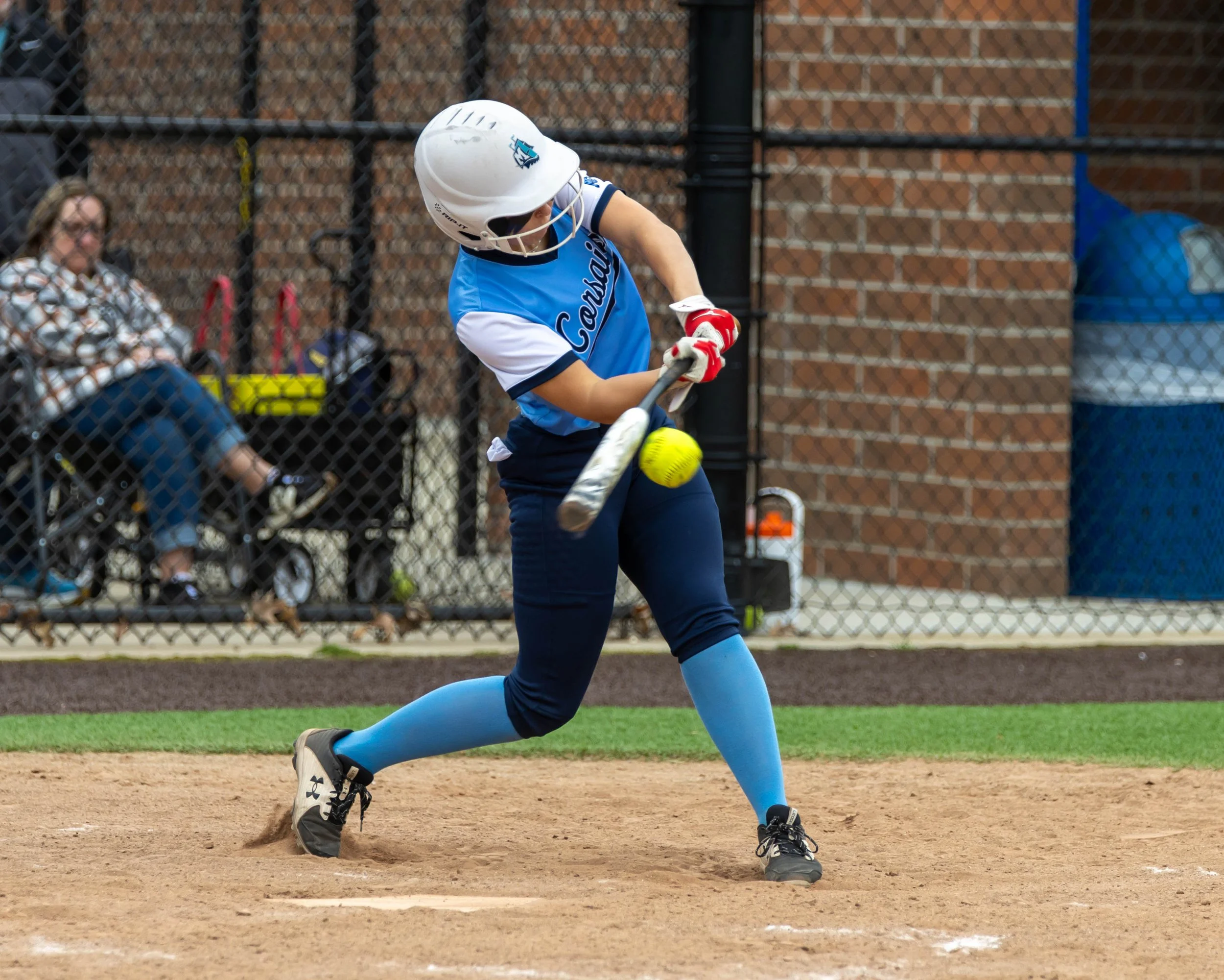 Mott batter hits the ball