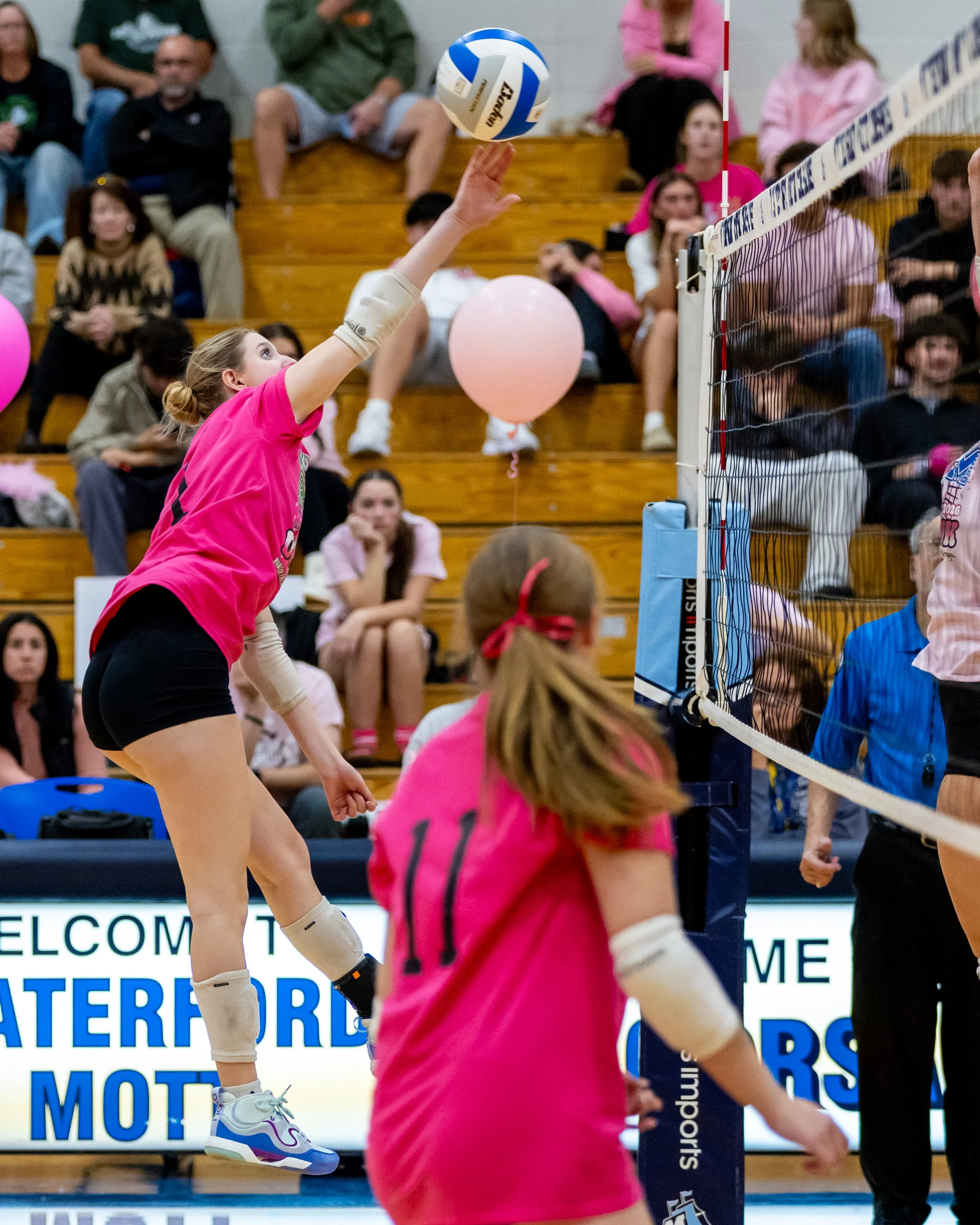 Kettering player hits the ball