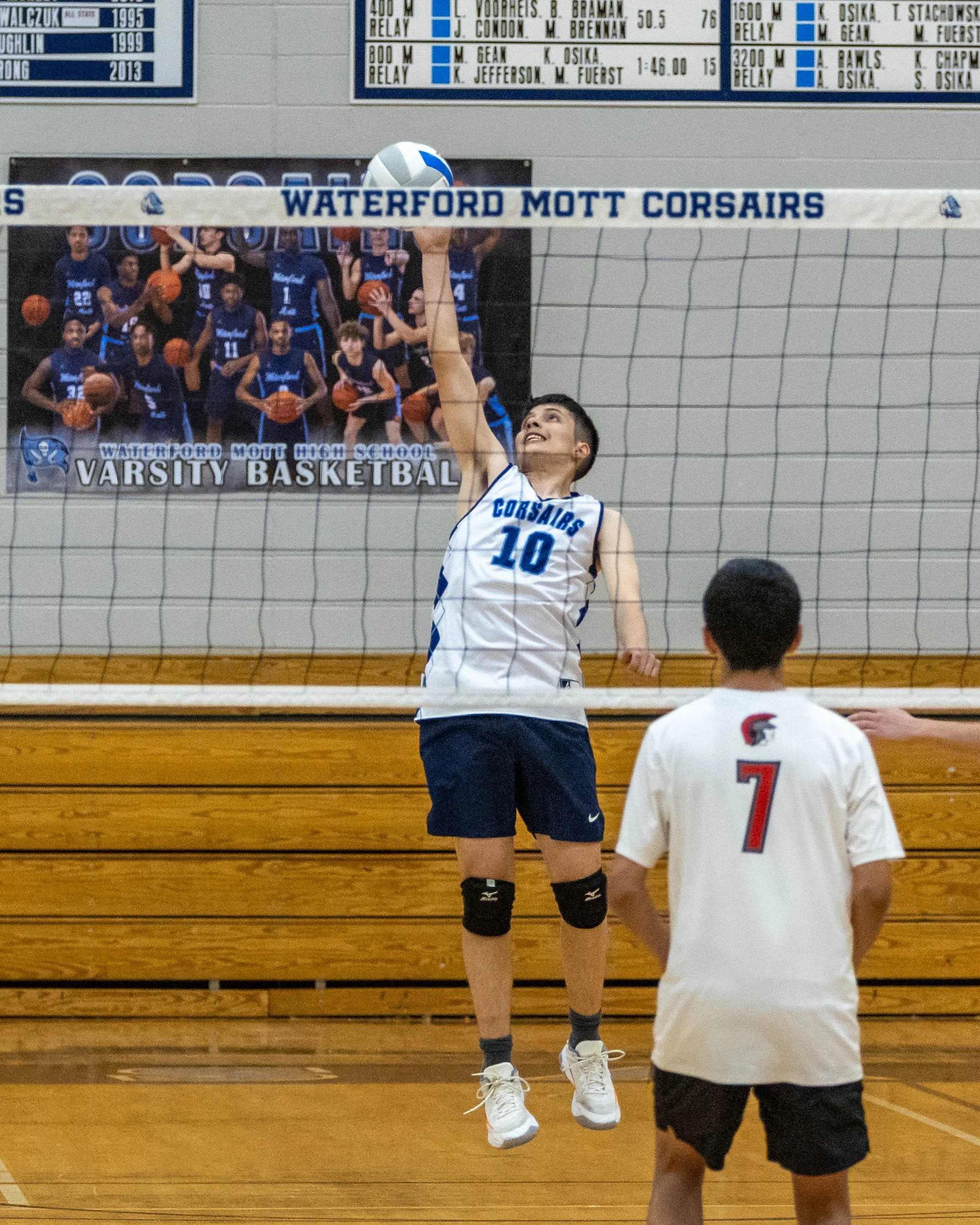 #10 serves the ball