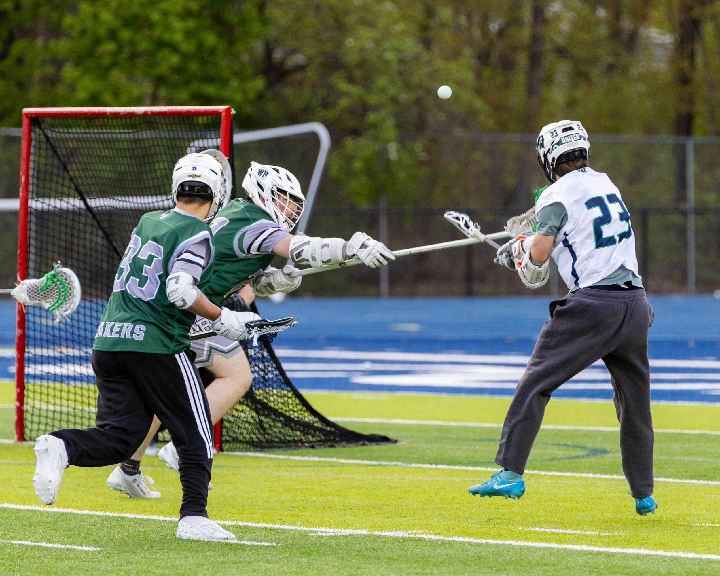 #23 shoots at the net