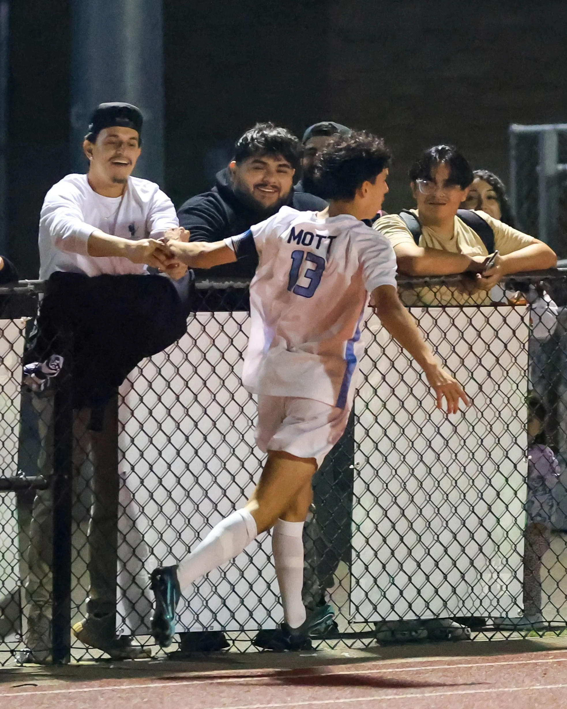 WM #13 celebrates a goal