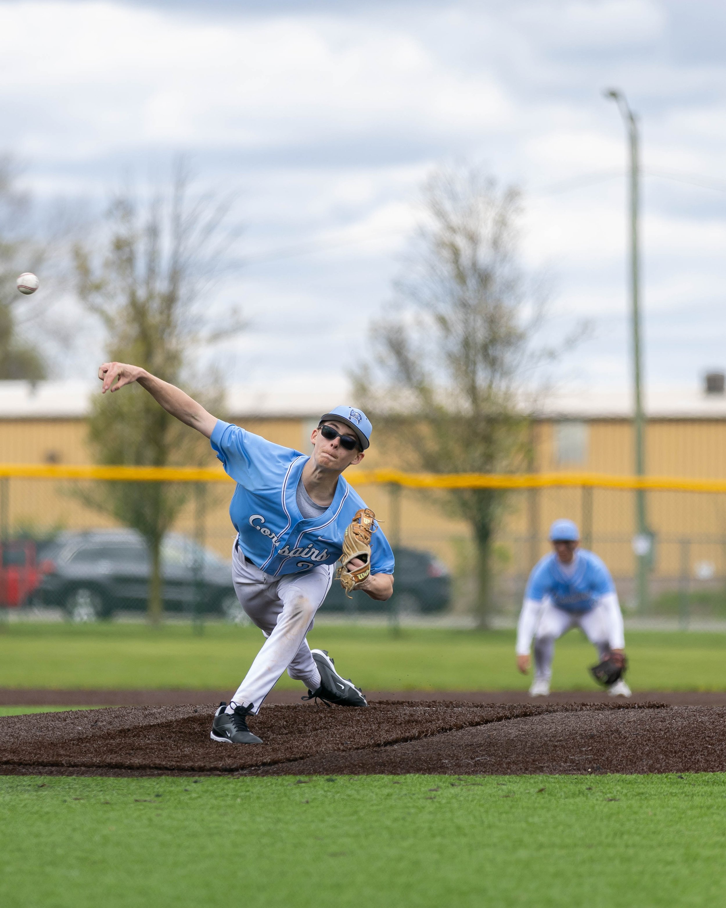 Mott #2 pitches the ball