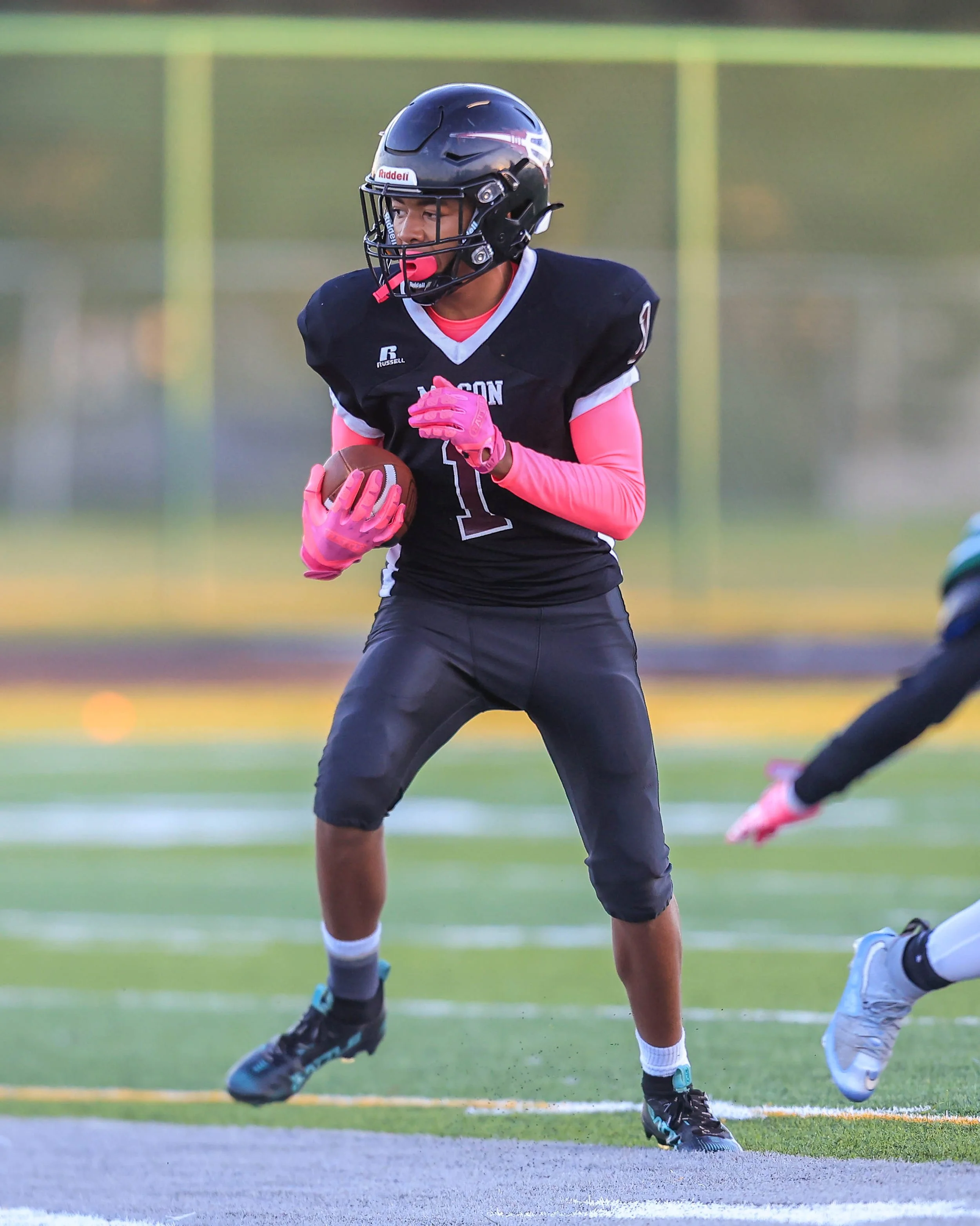 Mason #1 runs with the ball