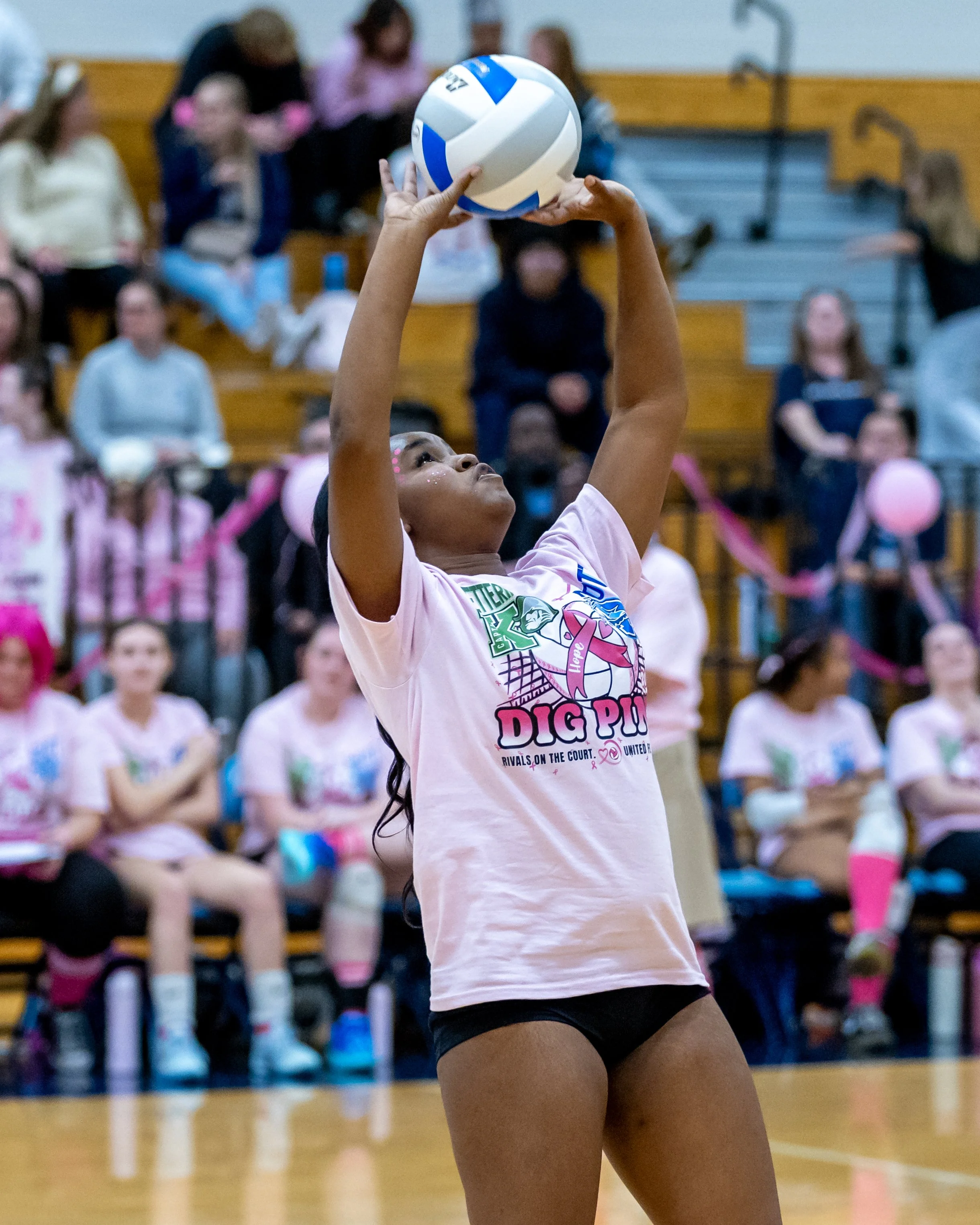 Mott player sets the ball
