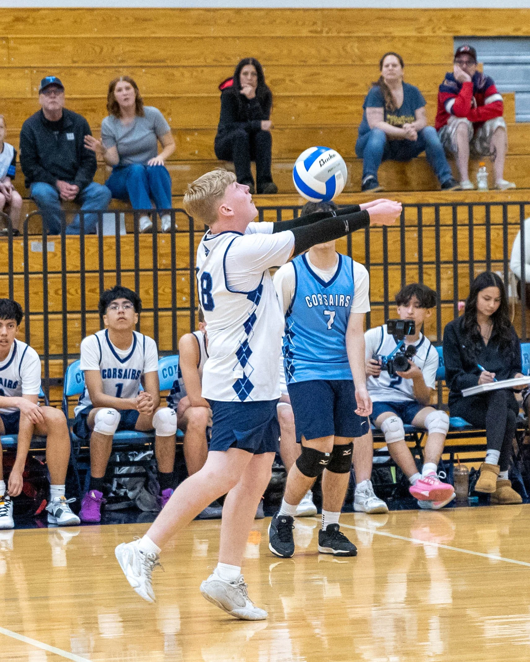 #18 hits the ball backwards