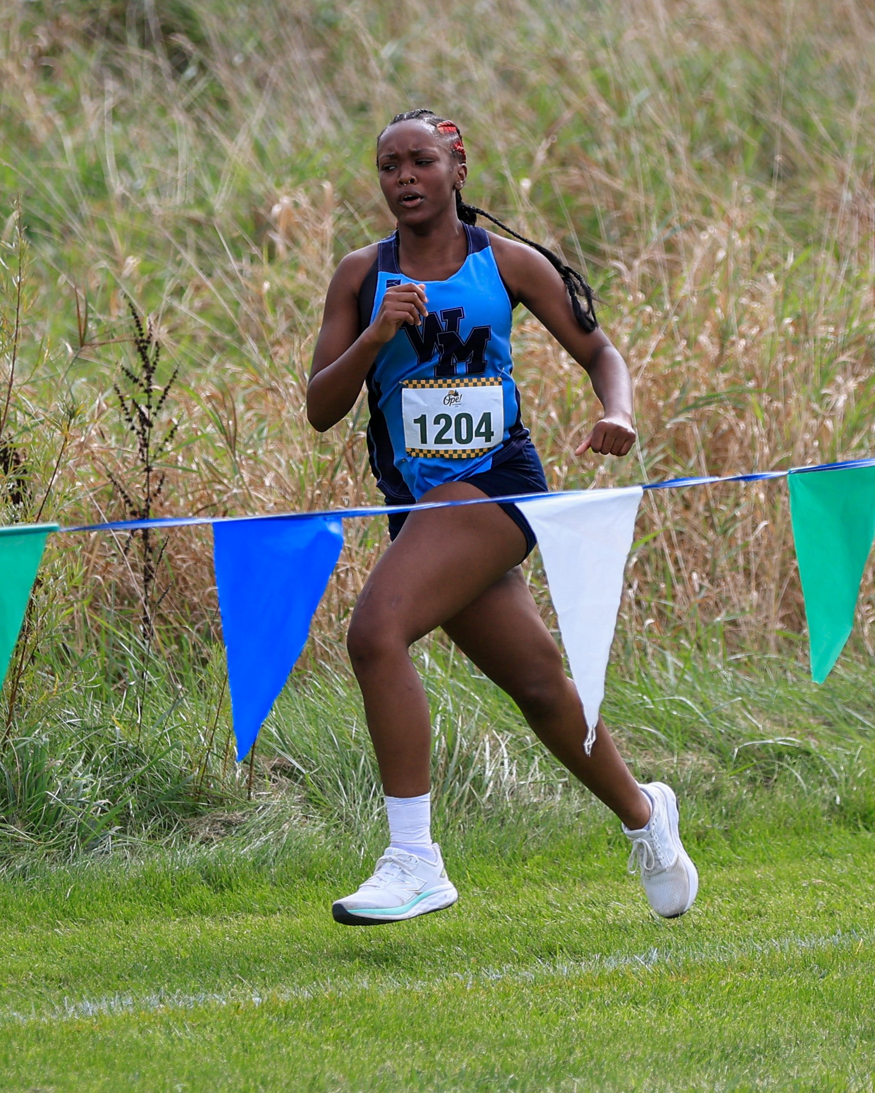 WM runner at the finish line.