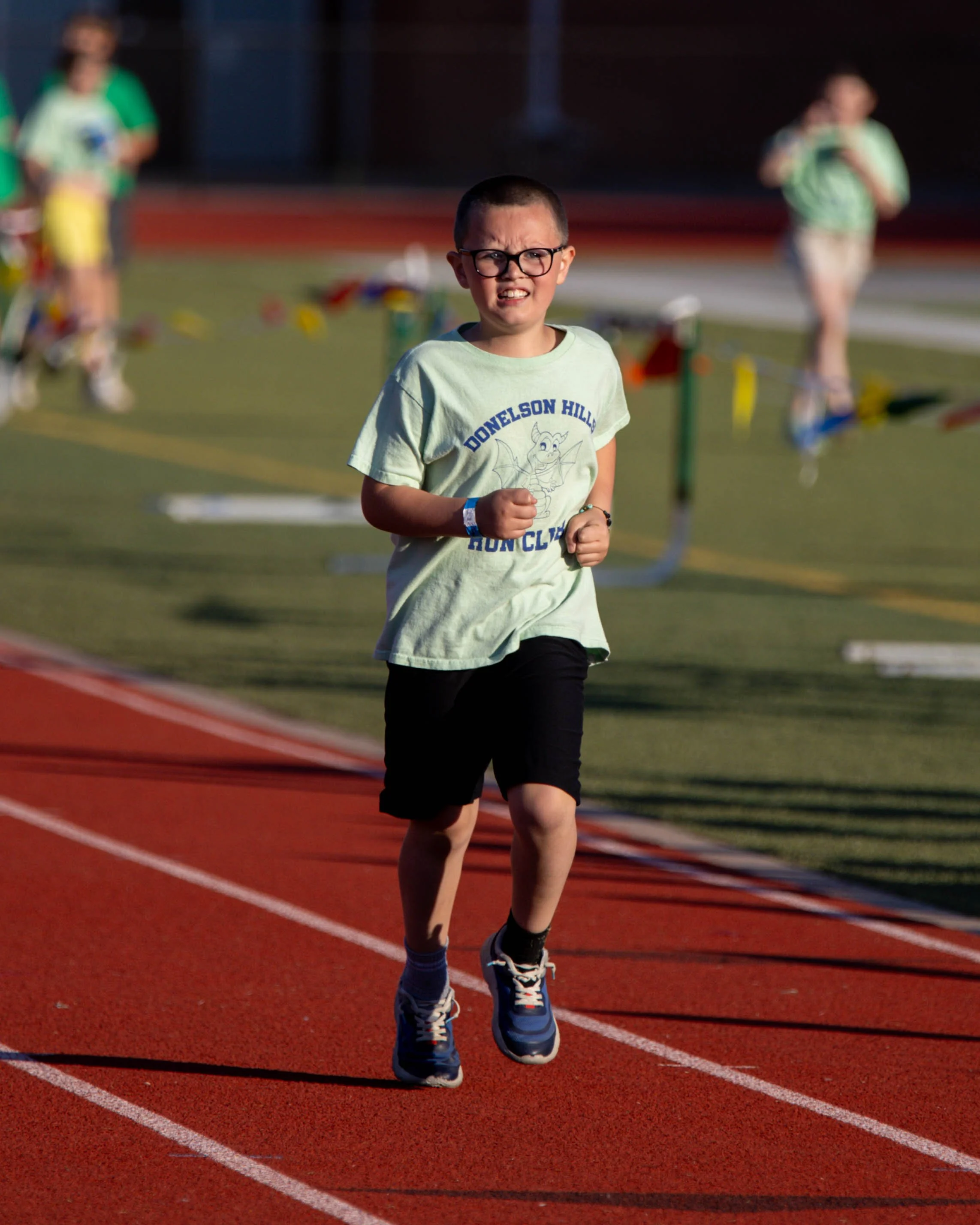 Donelson Hills runner at the finish line
