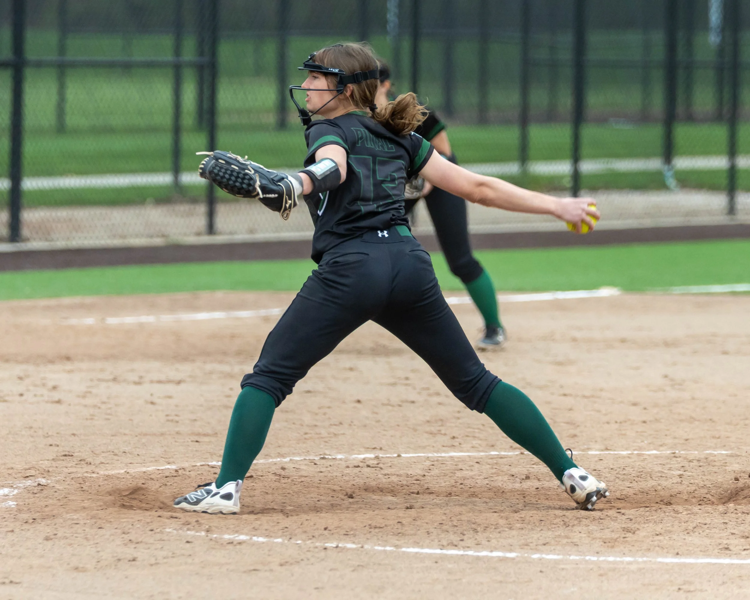 Kettering pitcher winds up for a pitch