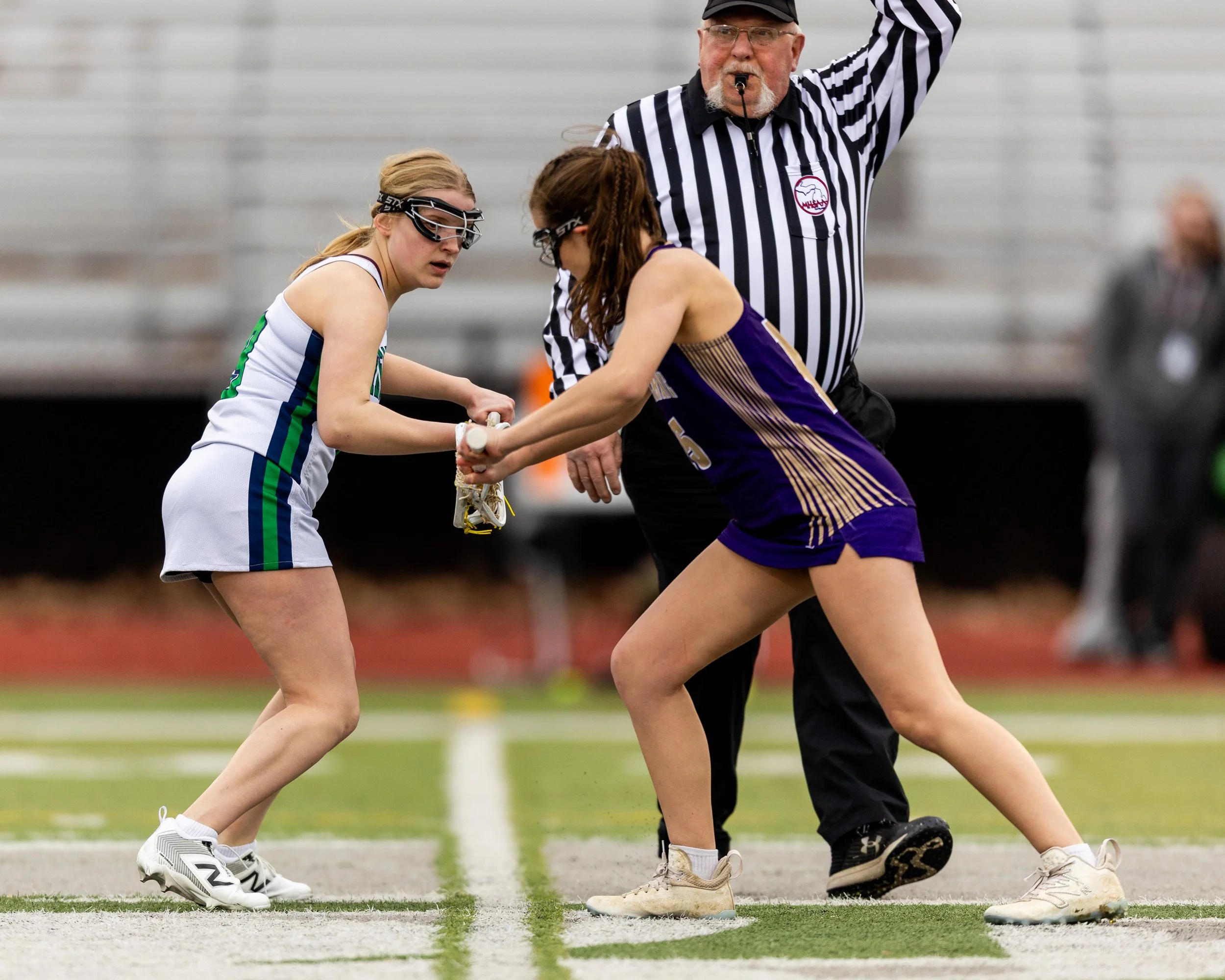 #9 faces off after the goal