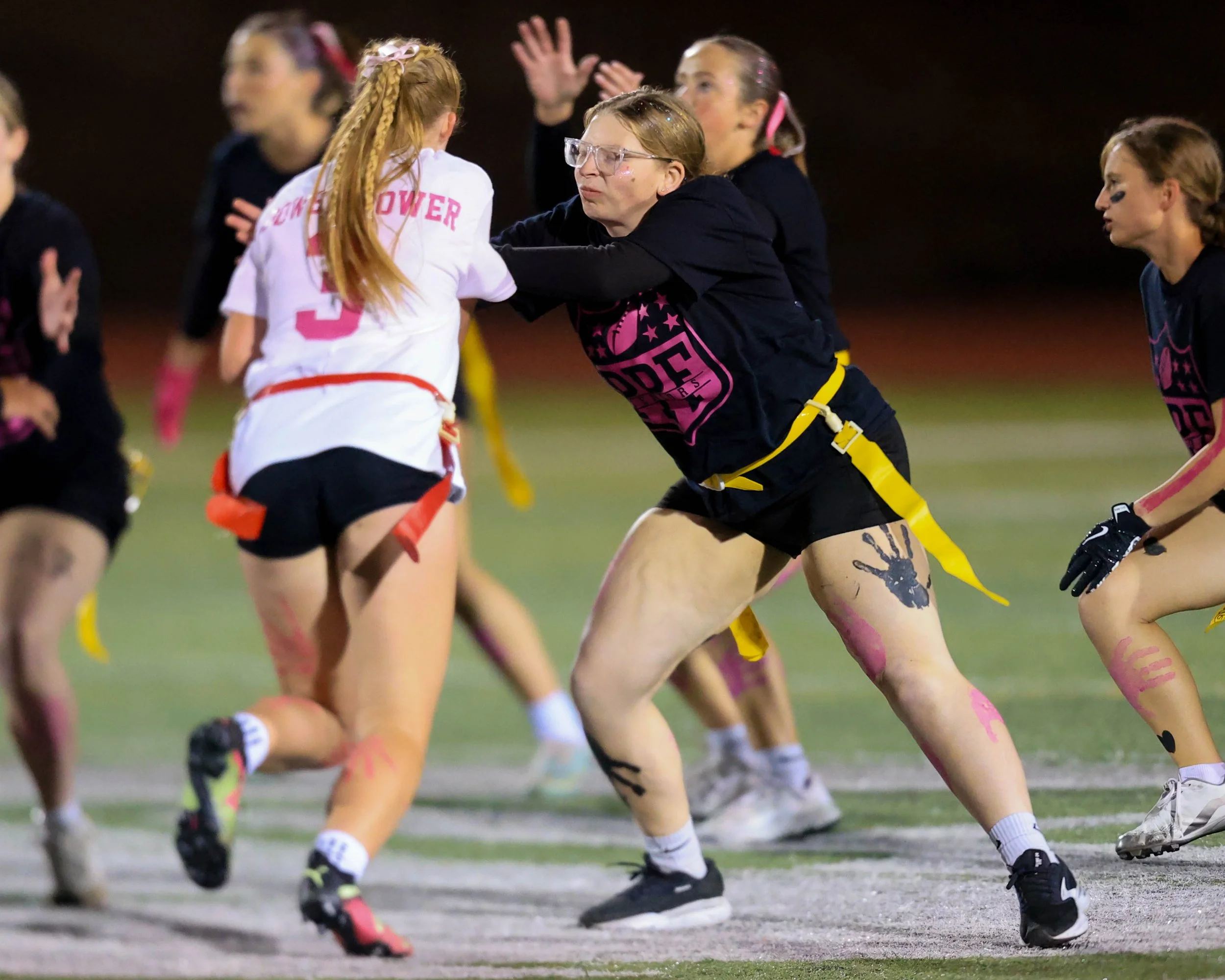 Senior offensive line blocks a Junior