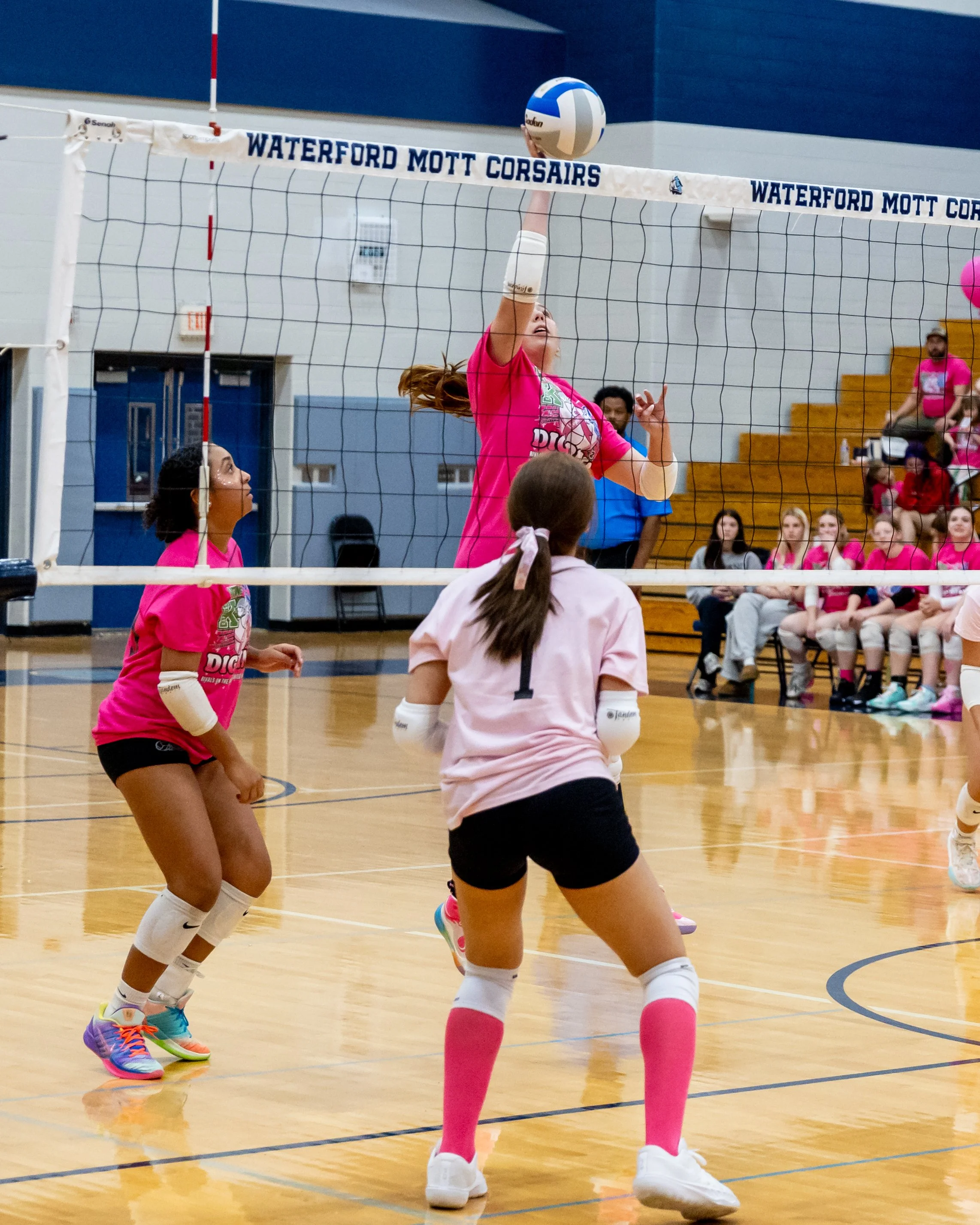 Kettering player hits the ball