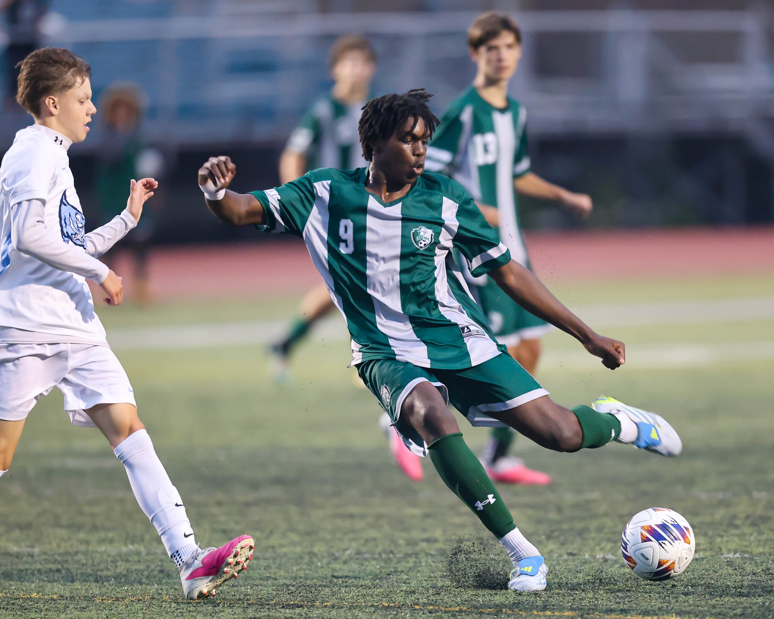 WK #9 kicks the ball
