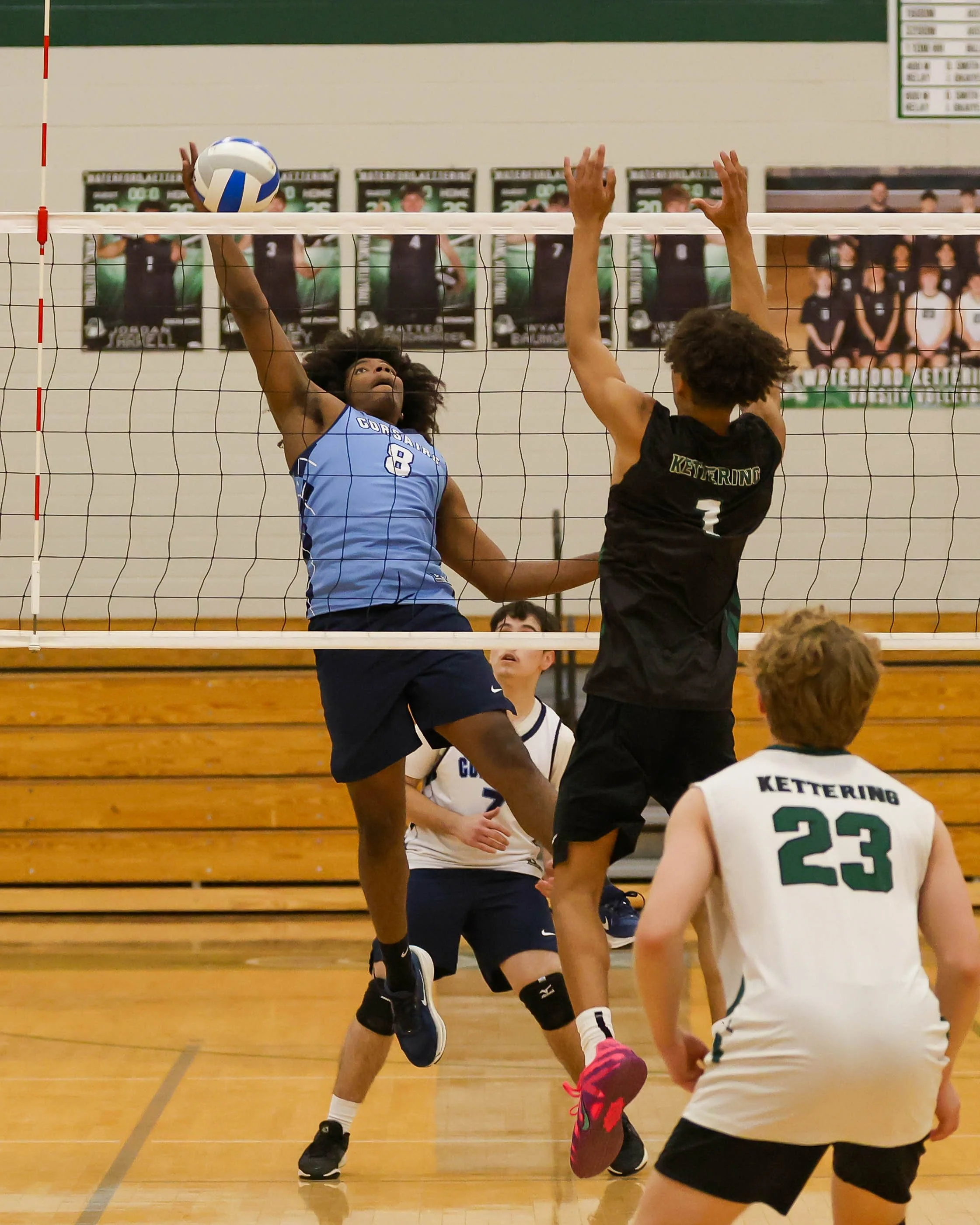 Mott #8 goes for the ball