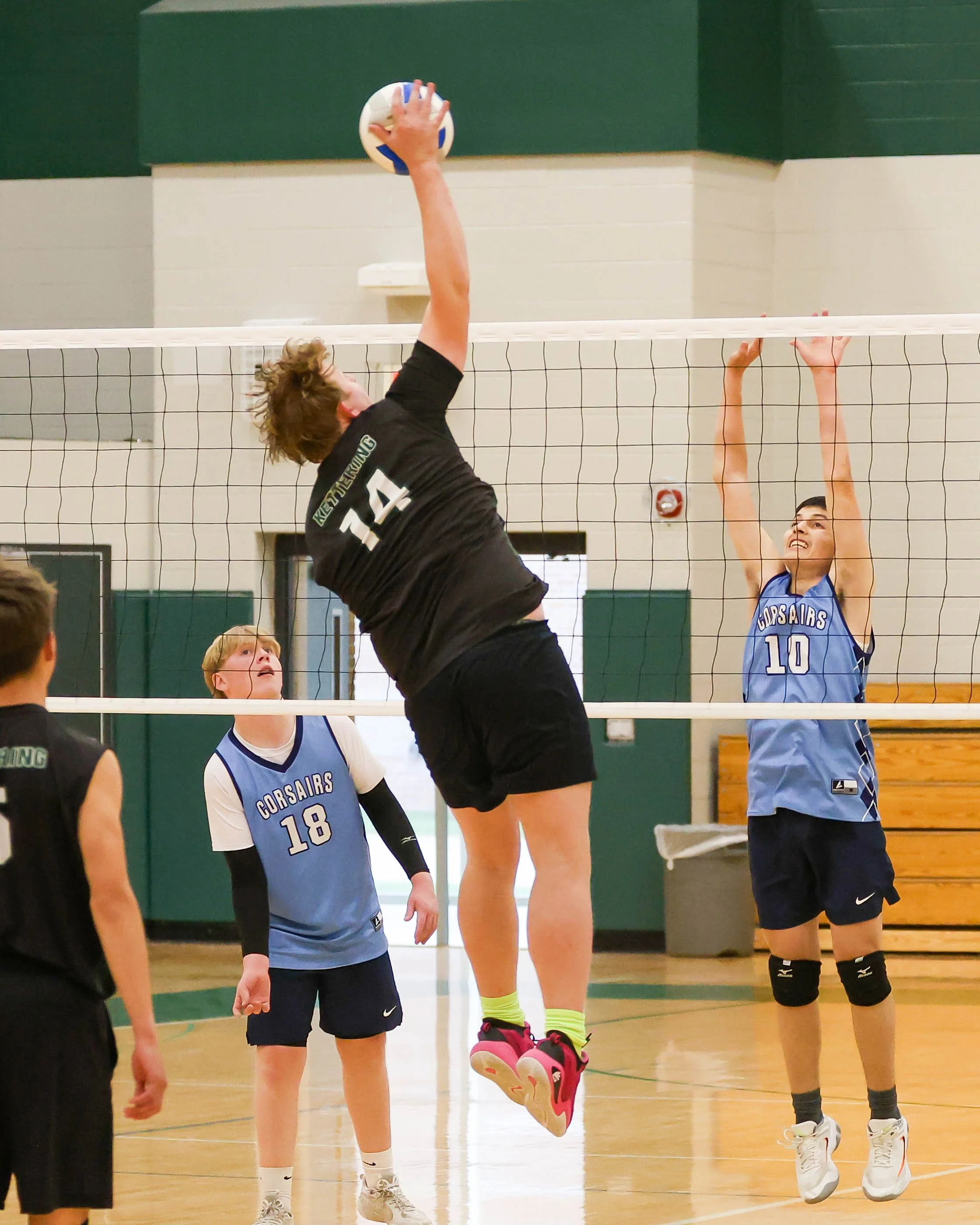 Kettering #14 spikes the ball