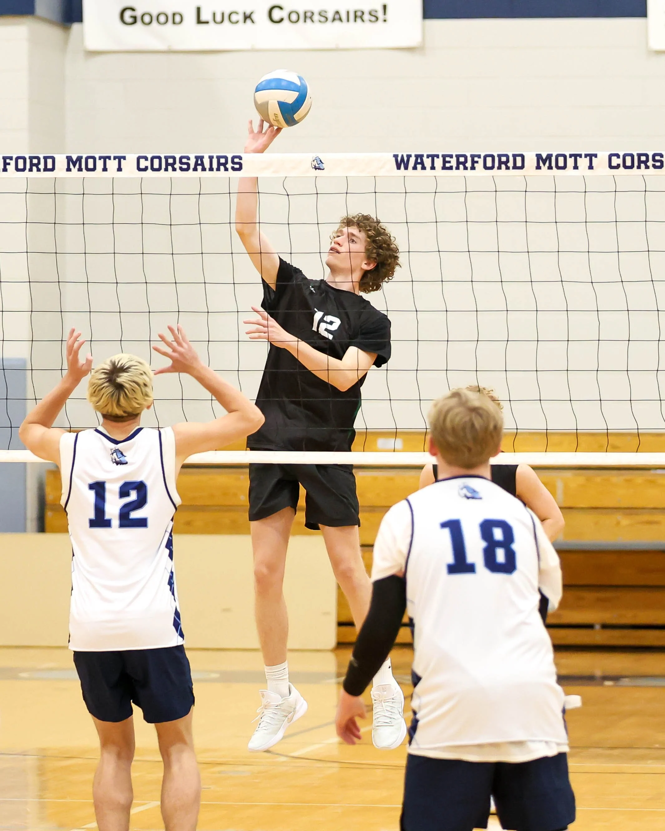 Kettering #12 spikes the ball