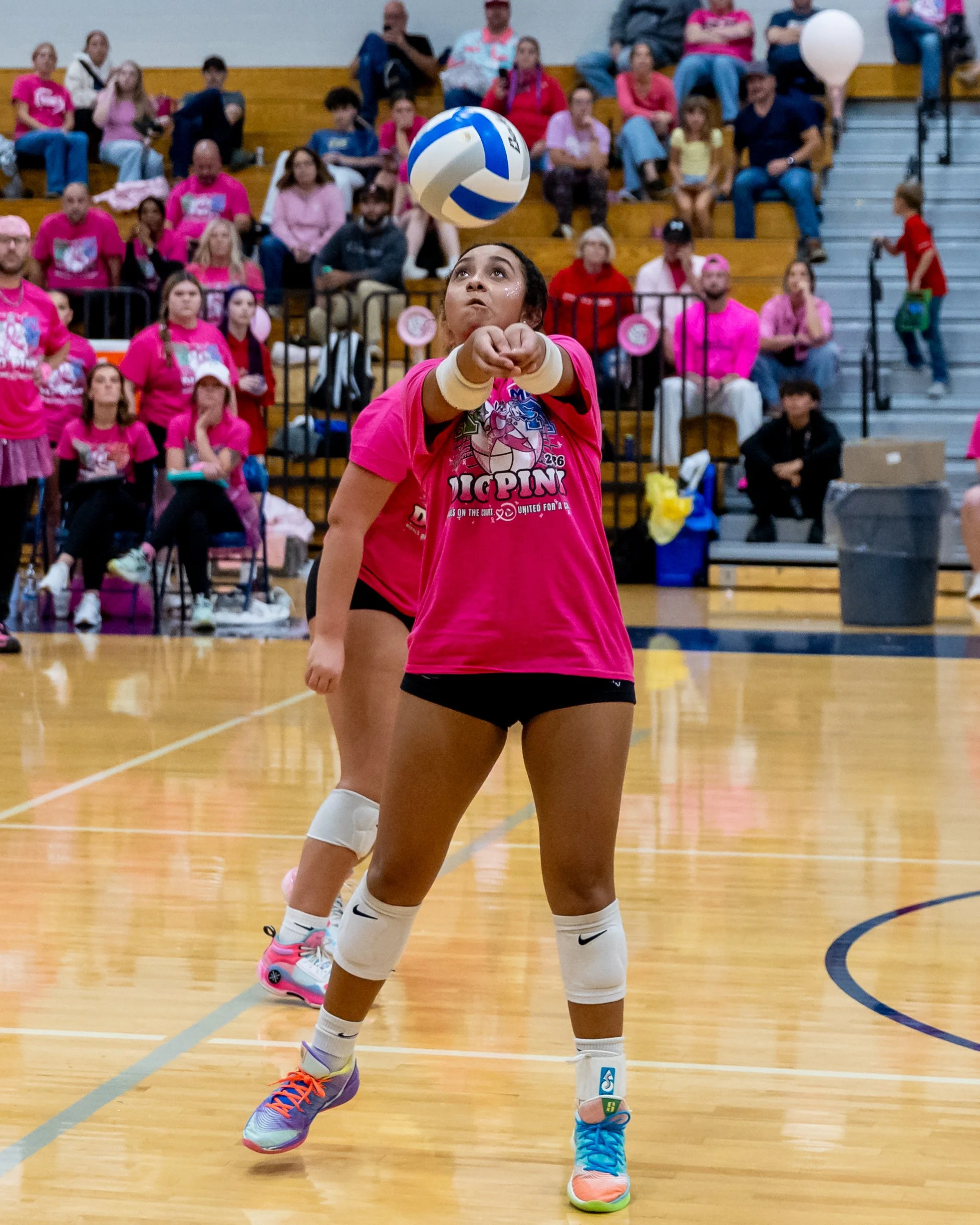 Kettering player hits the ball