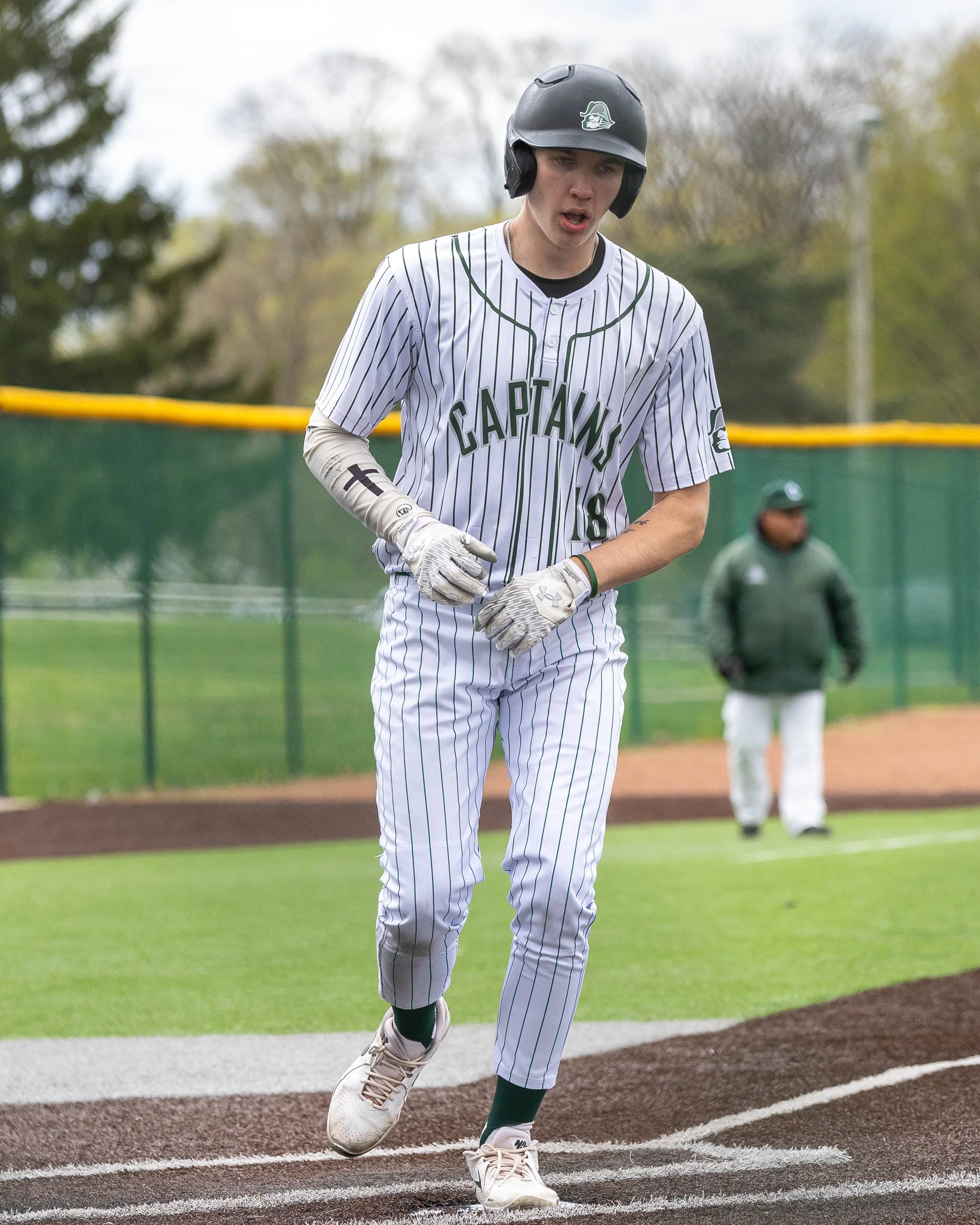 Kettering #18 scores a run