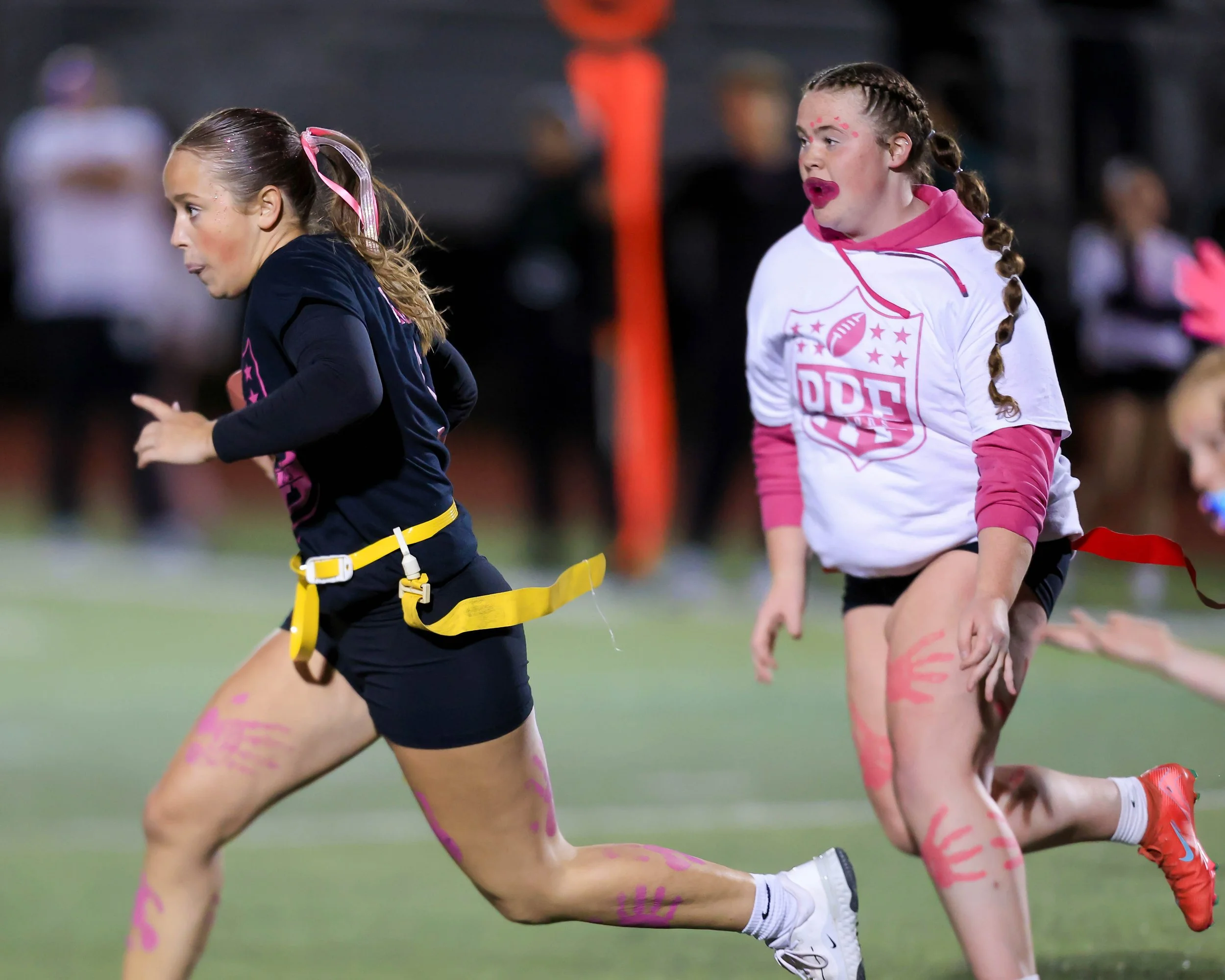 Senior quarterback runs with the ball
