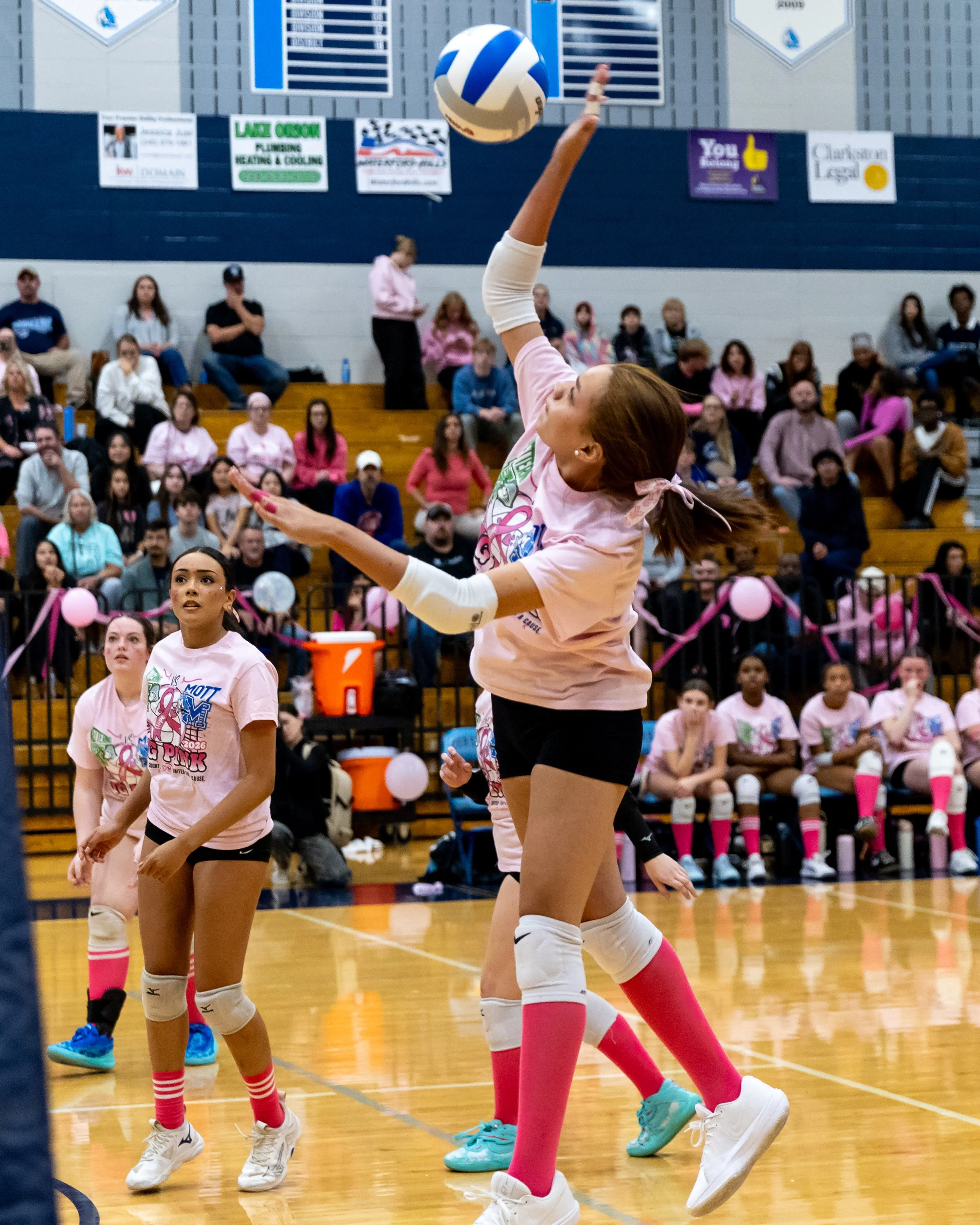 Mott player hits the ball