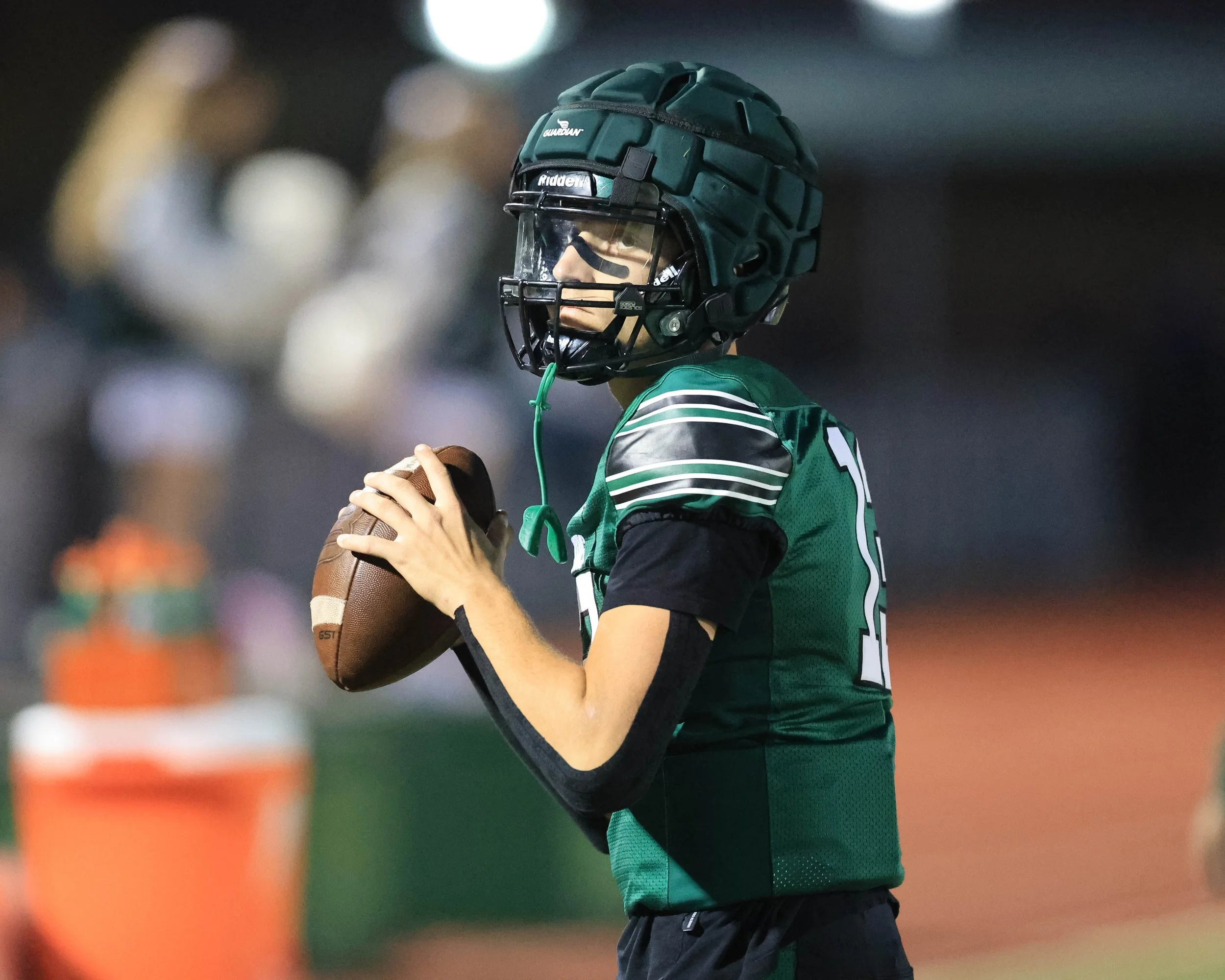 WK #13 warms up on the side line