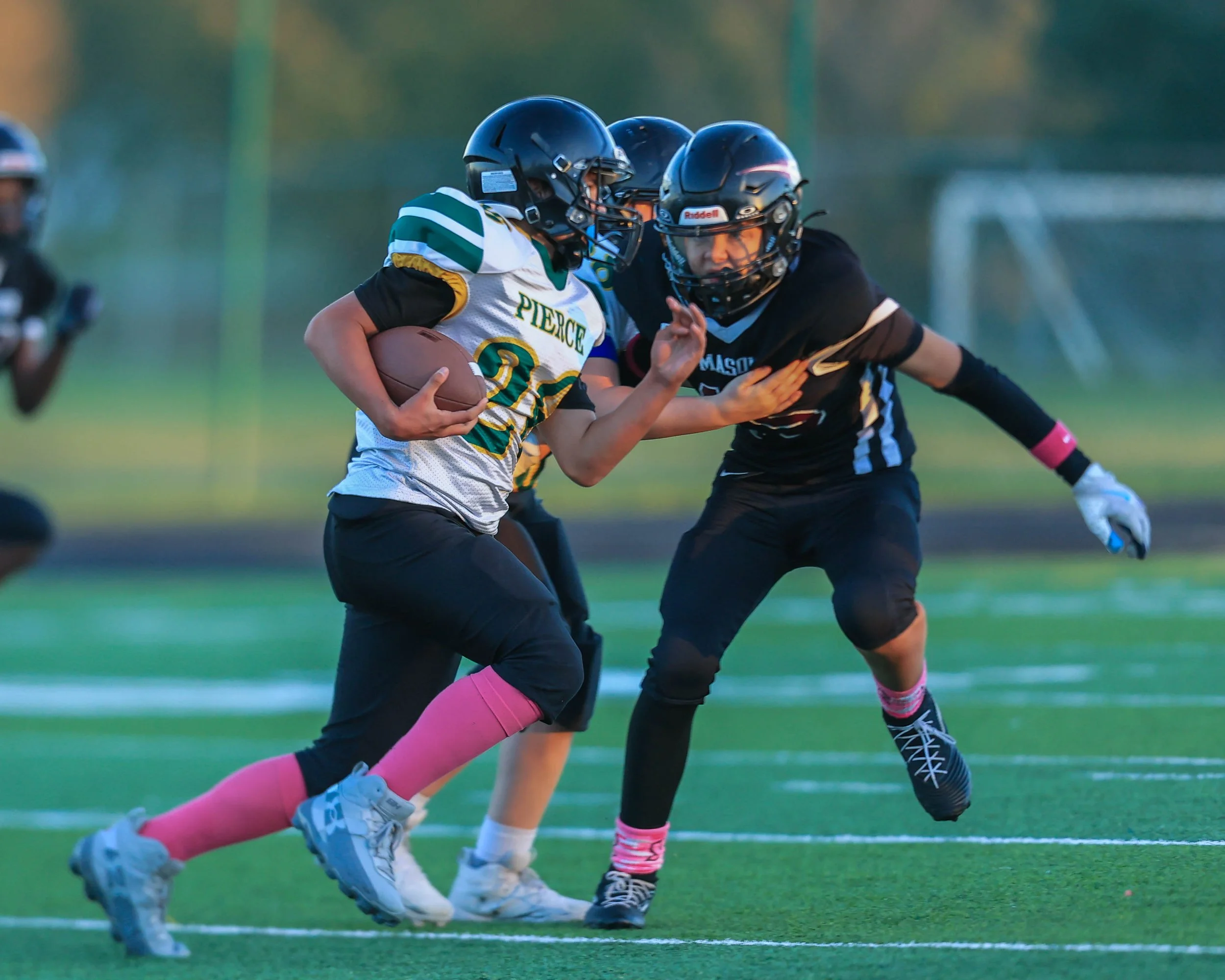 Pierce #26 with the ball
