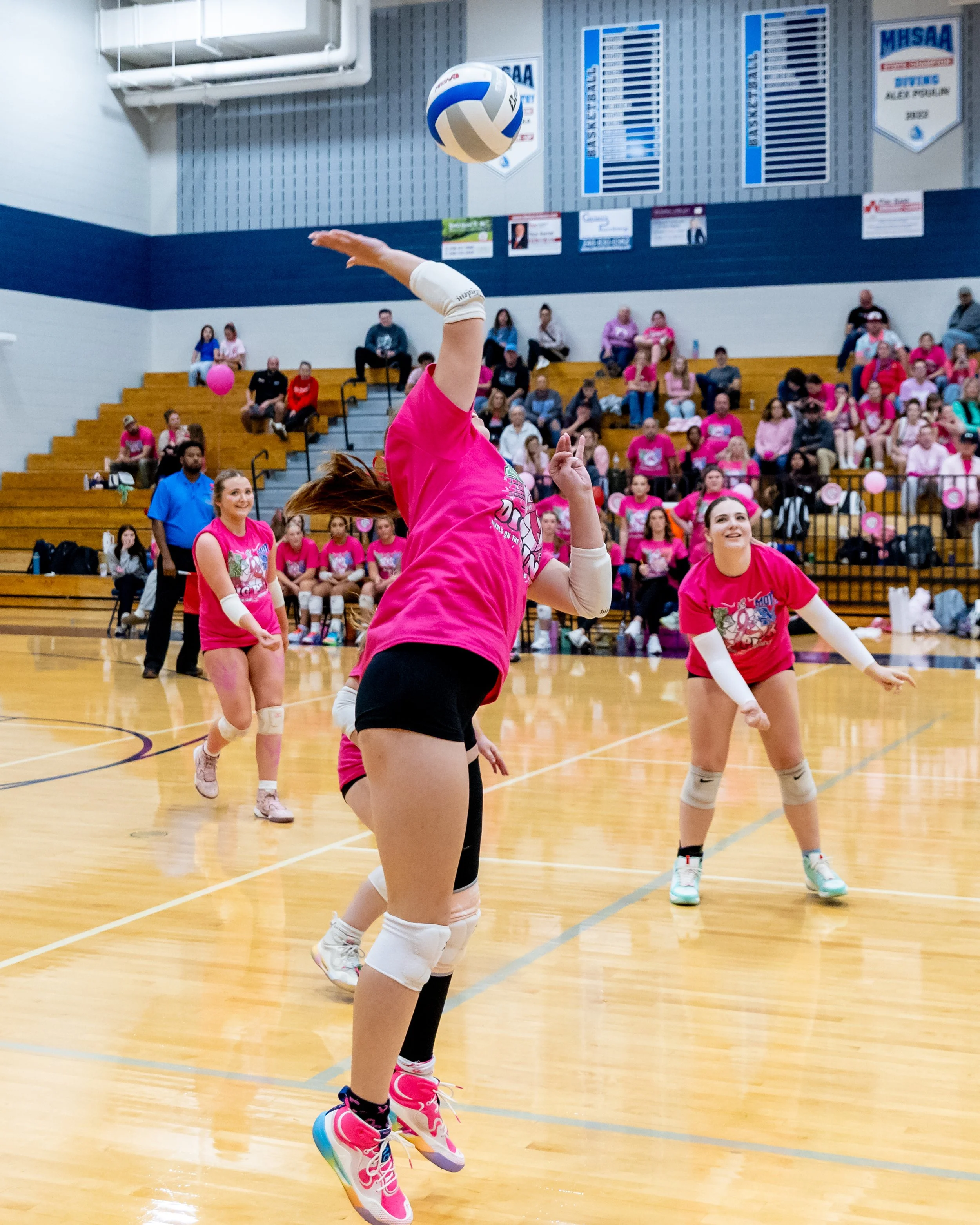 Kettering player hits the ball